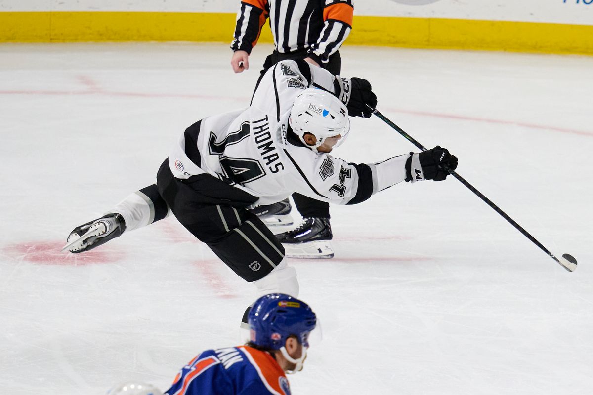 Ontario reign forward Akil Thomas (14) shoots a goal attempt during an AHL hockey game against the Bakersfield Condors, Friday November 21, 2025 in Ontario, Calif. Ontario reign forward Akil Thomas (14) shoots a goal attempt during an AHL hockey game against the Bakersfield Condors, Friday November 21, 2025 in Ontario, Calif.