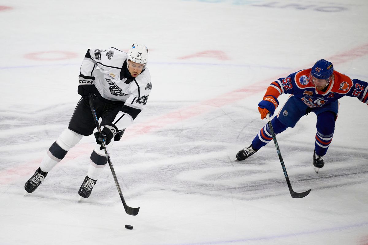 Ontario reign forward Andre Lee (26) gains possession during an AHL hockey game against the Bakersfield Condors, Friday November 21, 2025 in Ontario, Calif. Ontario reign forward Andre Lee (26) gains possession during an AHL hockey game against the Bakersfield Condors, Friday November 21, 2025 in Ontario, Calif.