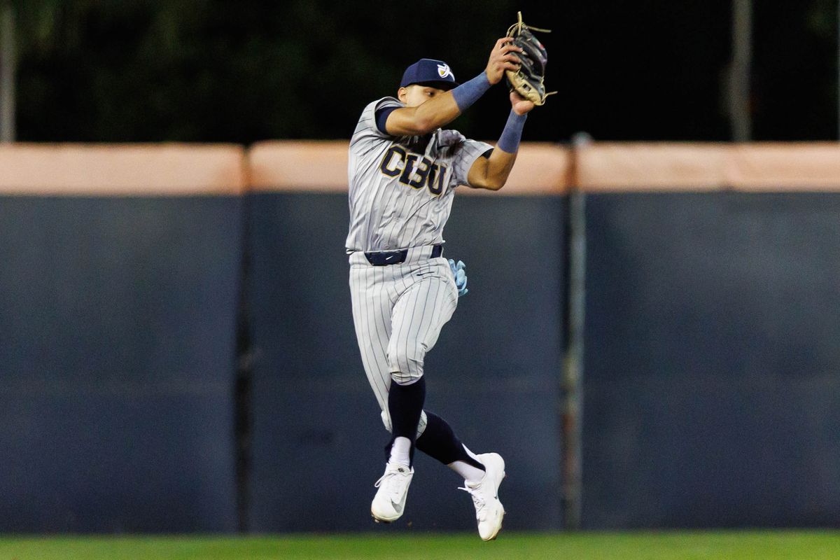 CBU Lancers infielder Chris Ramirez (1) jumps to record an out during an NCAA Baseball game against the CSUF Titans on February 13, 2026 in Fullerton, California. CBU Lancers infielder Chris Ramirez (1) jumps to record an out during an NCAA Baseball game against the CSUF Titans on February 13, 2026 in Fullerton, California.