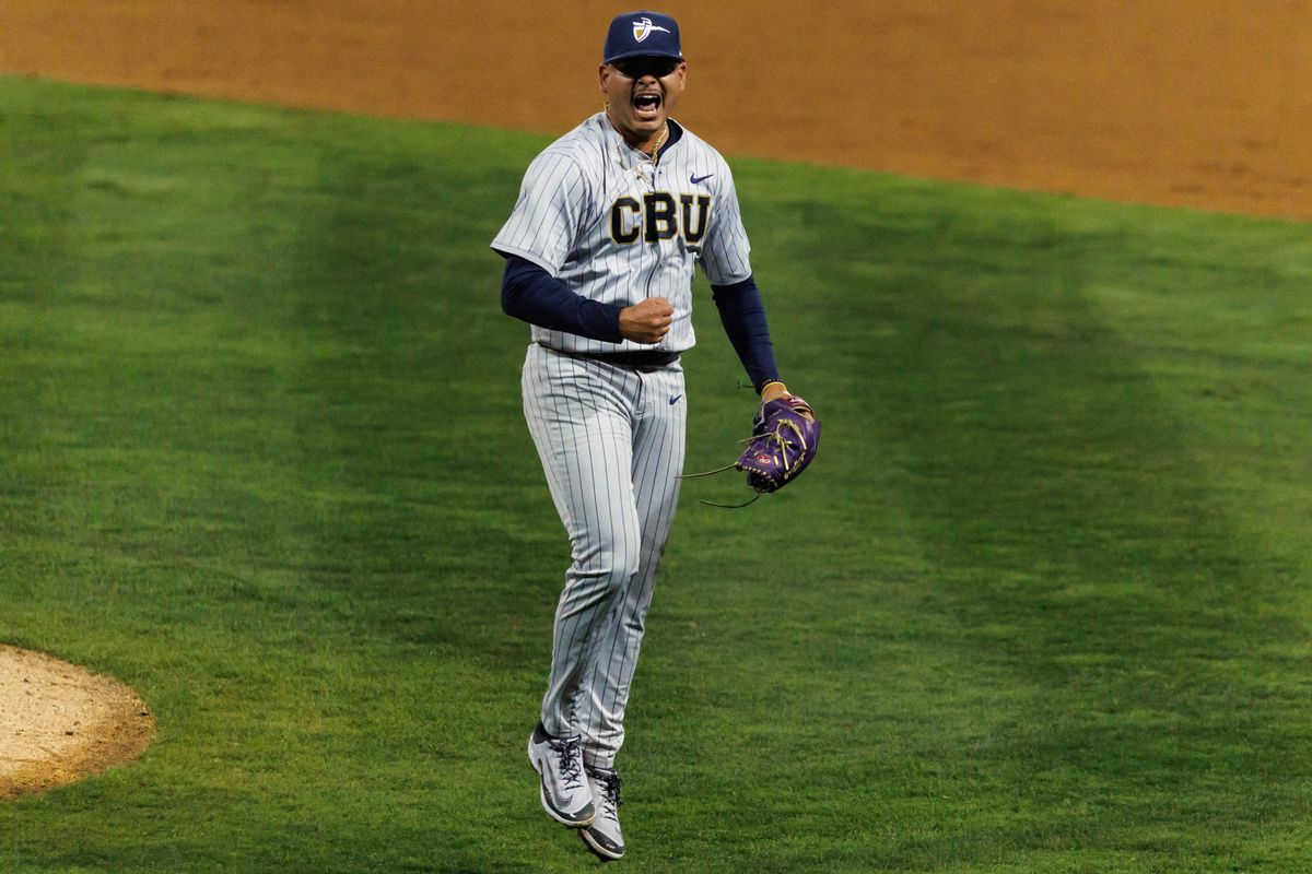 CBU Lancers pitcher Alfredo Capacete (23) celebrates after an inning-ending strikeout during an NCAA Baseball game against the CSUF Titans on February 13, 2026 in Fullerton, California. CBU Lancers pitcher Alfredo Capacete (23) celebrates after an inning-ending strikeout during an NCAA Baseball game against the CSUF Titans on February 13, 2026 in Fullerton, California.