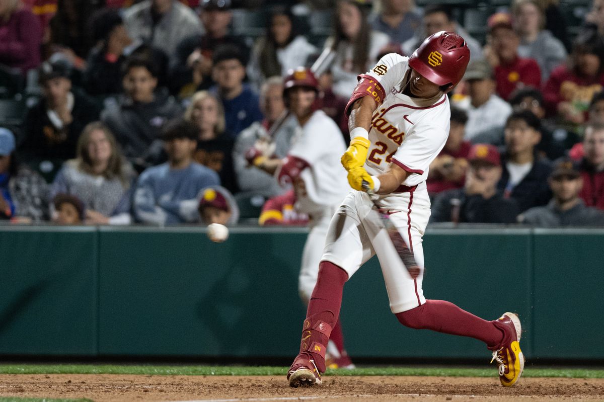USC Trojan catcher Augie Lopez (24) makes a base hit during an NCAA Men's baseball game between the USC Trojans and Pepperdine Wave Friday February 13,2026 at Dedeaux Field in Los Angeles Calif USC Trojan catcher Augie Lopez (24) makes a base hit during an NCAA Men's baseball game between the USC Trojans and Pepperdine Wave Friday February 13,2026 at Dedeaux Field in Los Angeles Calif