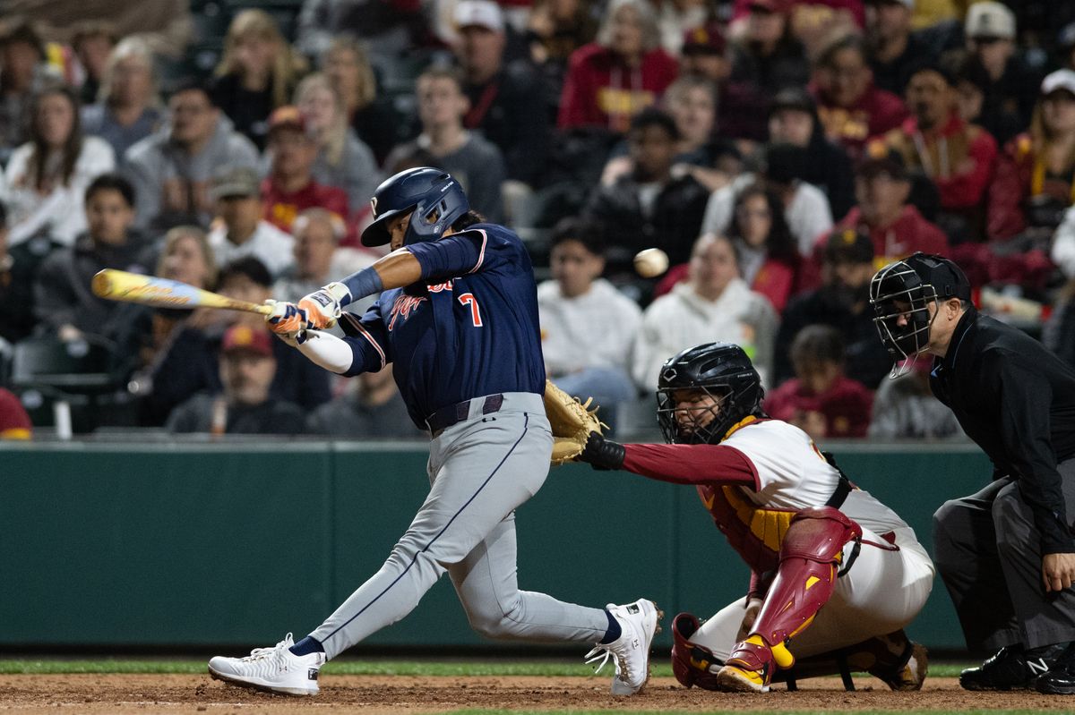 Pepperdine Wave infielder Julian Nunez (7) swings and misses the ball during an NCAA Men's baseball game between the USC Trojans and Pepperdine Wave Friday February 13,2026 at Dedeaux Field in Los Angeles Calif Pepperdine Wave infielder Julian Nunez (7) swings and misses the ball during an NCAA Men's baseball game between the USC Trojans and Pepperdine Wave Friday February 13,2026 at Dedeaux Field in Los Angeles Calif