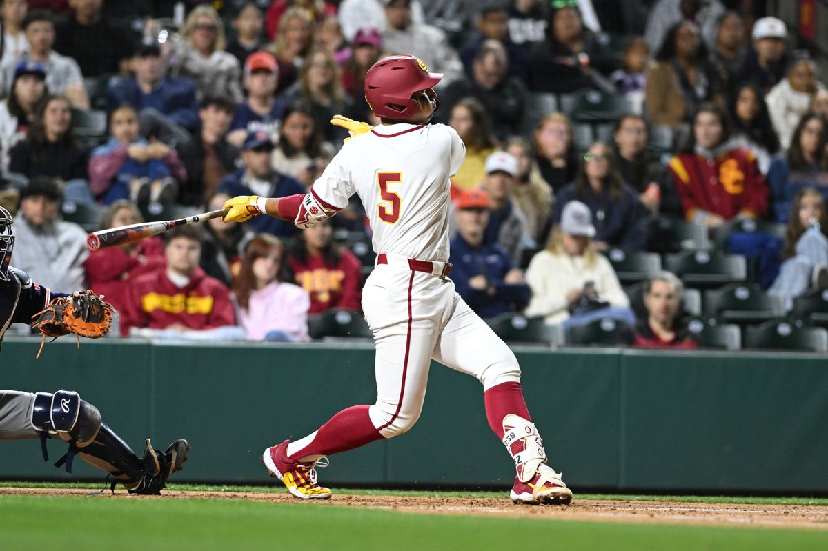 USC Trojan infielder Adrian Lopez (5) swings and misses the ball during an NCAA Men's baseball game between the USC Trojans and Pepperdine Wave Friday February 13,2026 at Dedeaux Field in Los Angeles Calif USC Trojan infielder Adrian Lopez (5) swings and misses the ball during an NCAA Men's baseball game between the USC Trojans and Pepperdine Wave Friday February 13,2026 at Dedeaux Field in Los Angeles Calif