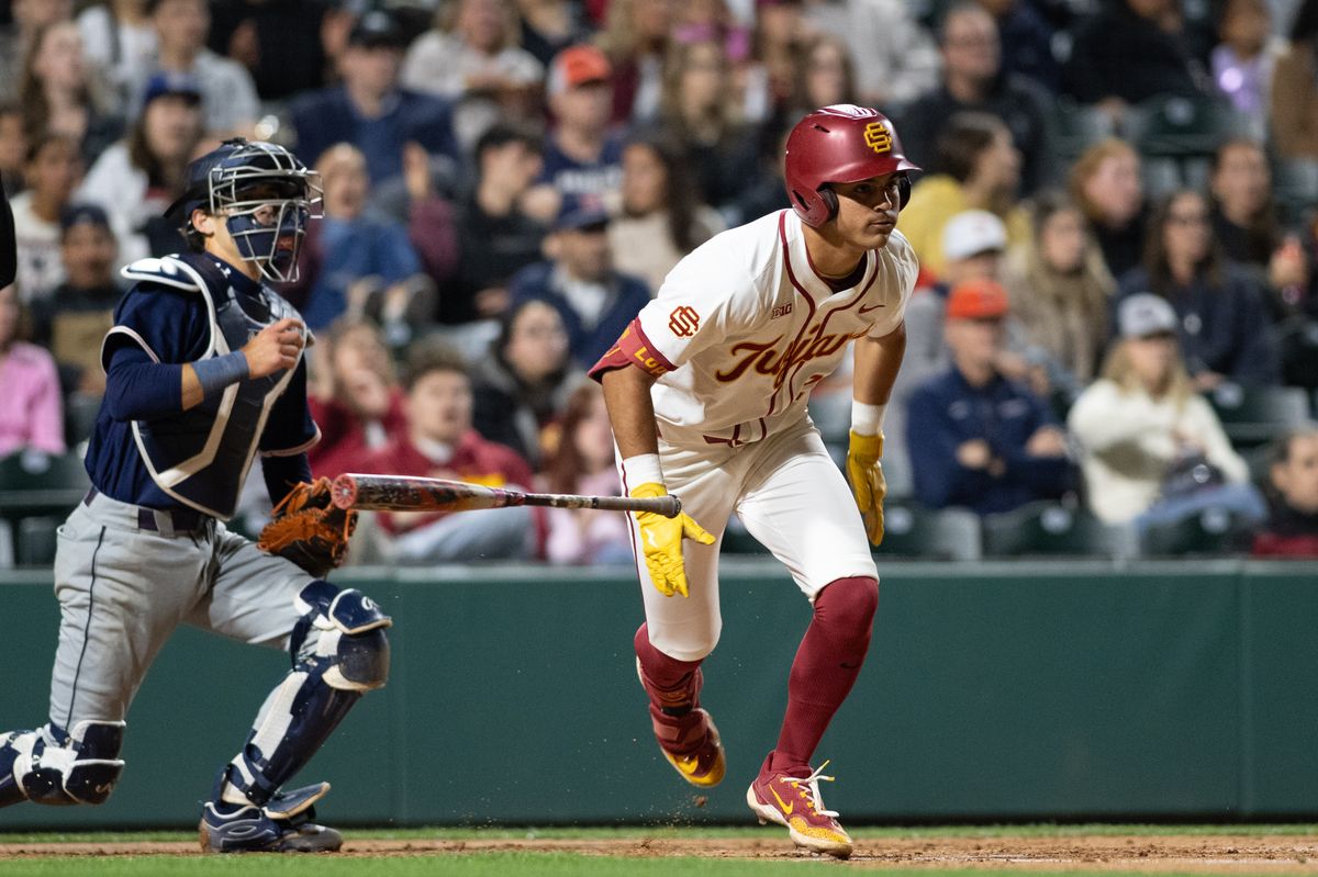 USC Trojan catcher Augie Lopez (5) runs after a base hit during an NCAA Men's baseball game between the USC Trojans and Pepperdine Wave Friday February 13,2026 at Dedeaux Field in Los Angeles Calif USC Trojan catcher Augie Lopez (5) runs after a base hit during an NCAA Men's baseball game between the USC Trojans and Pepperdine Wave Friday February 13,2026 at Dedeaux Field in Los Angeles Calif