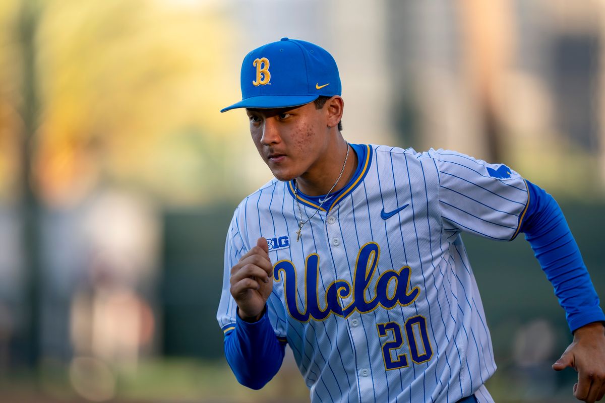 UCLA pitcher, Justin Lee (20) warming up before a NCAA baseball game against UC San Diego on February 13, 2026 at Jackie Robinson Stadium in Los Angeles, CA. UCLA pitcher, Justin Lee (20) warming up before a NCAA baseball game against UC San Diego on February 13, 2026 at Jackie Robinson Stadium in Los Angeles, CA.