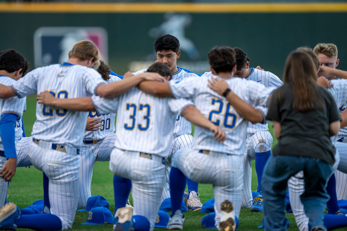 UCLA Bruins baseball team huddling up before a NCAA baseball game against UC San Diego on February 13, 2026 at Jackie Robinson Stadium in Los Angeles, CA. UCLA Bruins baseball team huddling up before a NCAA baseball game against UC San Diego on February 13, 2026 at Jackie Robinson Stadium in Los Angeles, CA.