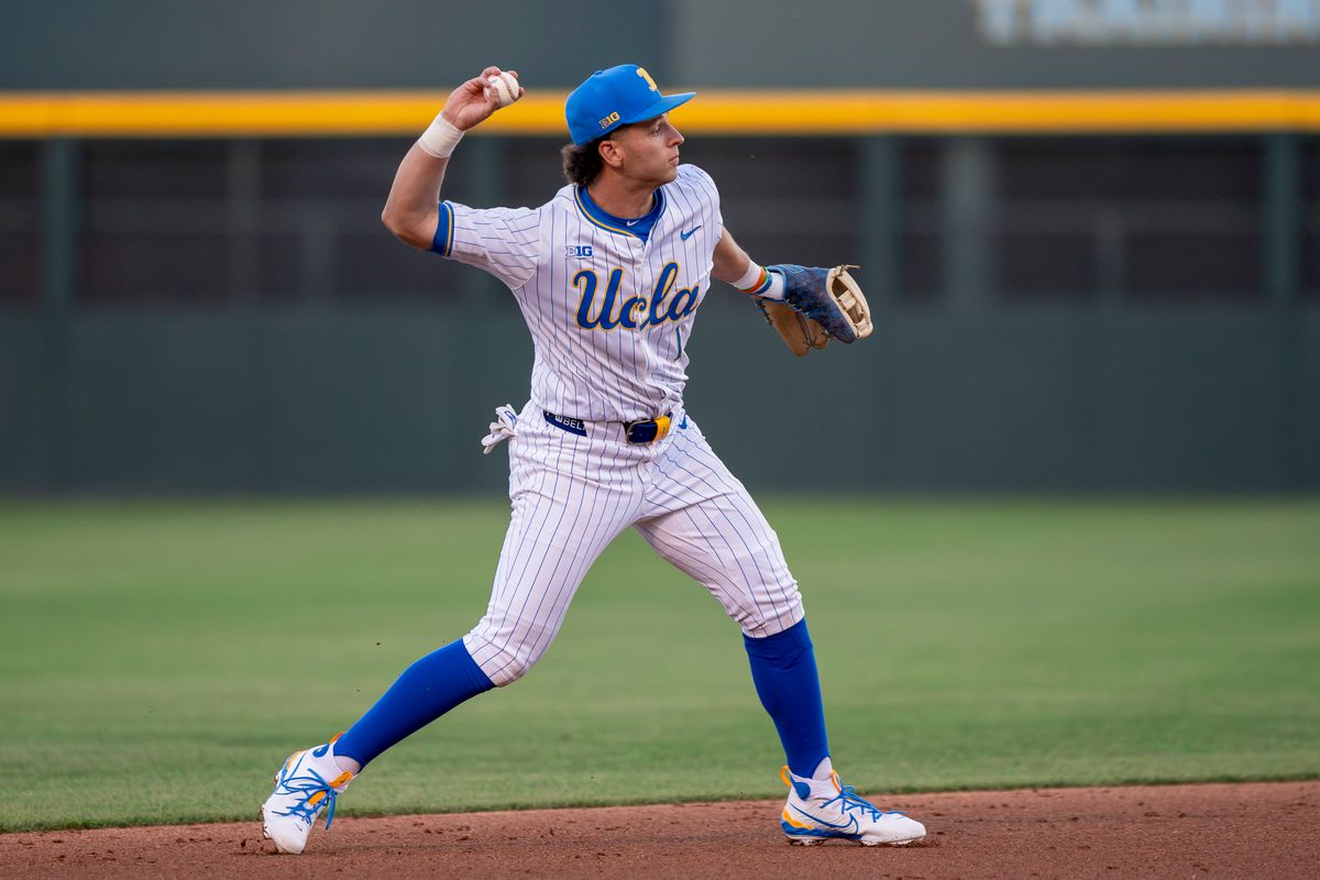 UCLA infielder, Roch Cholowsky fielding a ball to first base during a NCAA baseball game against UC San Diego on February 13, 2026 at Jackie Robinson Stadium in Los Angeles, CA. UCLA infielder, Roch Cholowsky fielding a ball to first base during a NCAA baseball game against UC San Diego on February 13, 2026 at Jackie Robinson Stadium in Los Angeles, CA.
