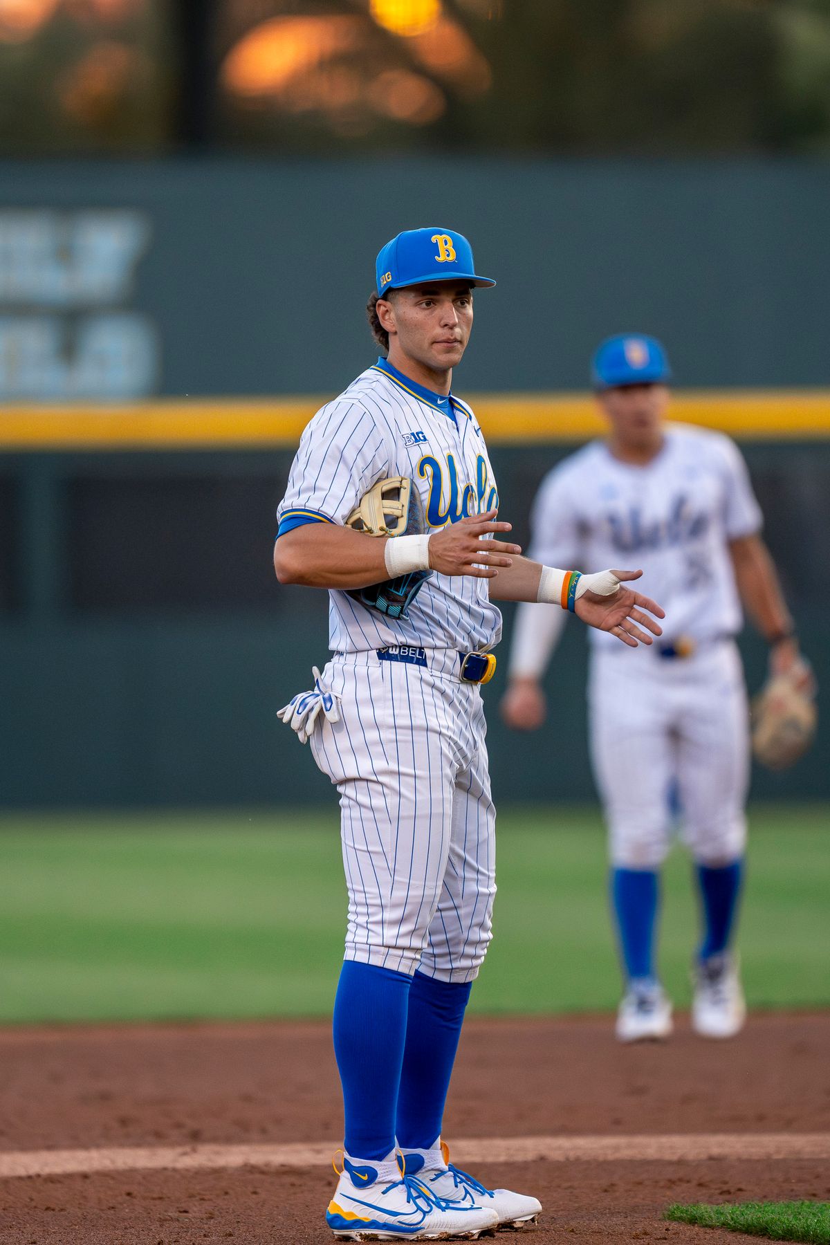 UCLA infielder, Roch Cholowsky, (1) gesturing to teammates during a NCAA baseball game against UC San Diego on February 13, 2026 at Jackie Robinson Stadium in Los Angeles, CA. UCLA infielder, Roch Cholowsky, (1) gesturing to teammates during a NCAA baseball game against UC San Diego on February 13, 2026 at Jackie Robinson Stadium in Los Angeles, CA.