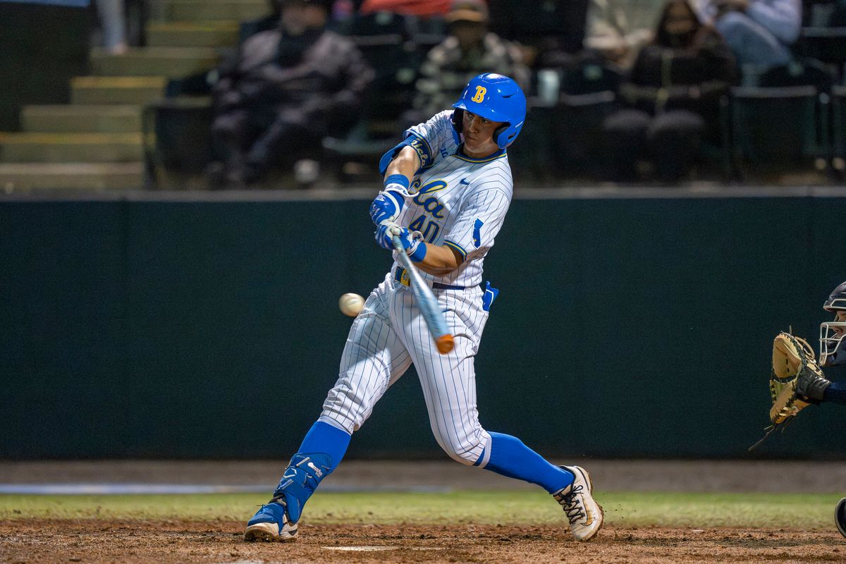 UCLA catcher, Cashel Dugger (40) at bat, mid-out during a NCAA baseball game against UC San Diego on February 13, 2026 at Jackie Robinson Stadium in Los Angeles, CA. UCLA catcher, Cashel Dugger (40) at bat, mid-out during a NCAA baseball game against UC San Diego on February 13, 2026 at Jackie Robinson Stadium in Los Angeles, CA.