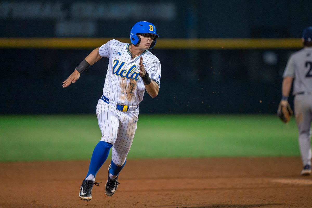 UCLA infielder, Roman Martin (7) running for third base after a teammate's hit during a NCAA baseball game against UC San Diego on February 13, 2026 at Jackie Robinson Stadium in Los Angeles, CA. UCLA infielder, Roman Martin (7) running for third base after a teammate's hit during a NCAA baseball game against UC San Diego on February 13, 2026 at Jackie Robinson Stadium in Los Angeles, CA.