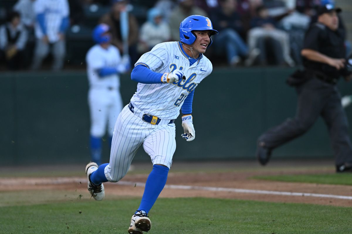 UCLA infielder Aiden Aguayo (26) sprints to first base after making contact during a game between TCU and UCLA on Friday, February 20,2026 at Jackie Robinson Stadium in Los Angeles Calif UCLA infielder Aiden Aguayo (26) sprints to first base after making contact during a game between TCU and UCLA on Friday, February 20,2026 at Jackie Robinson Stadium in Los Angeles Calif