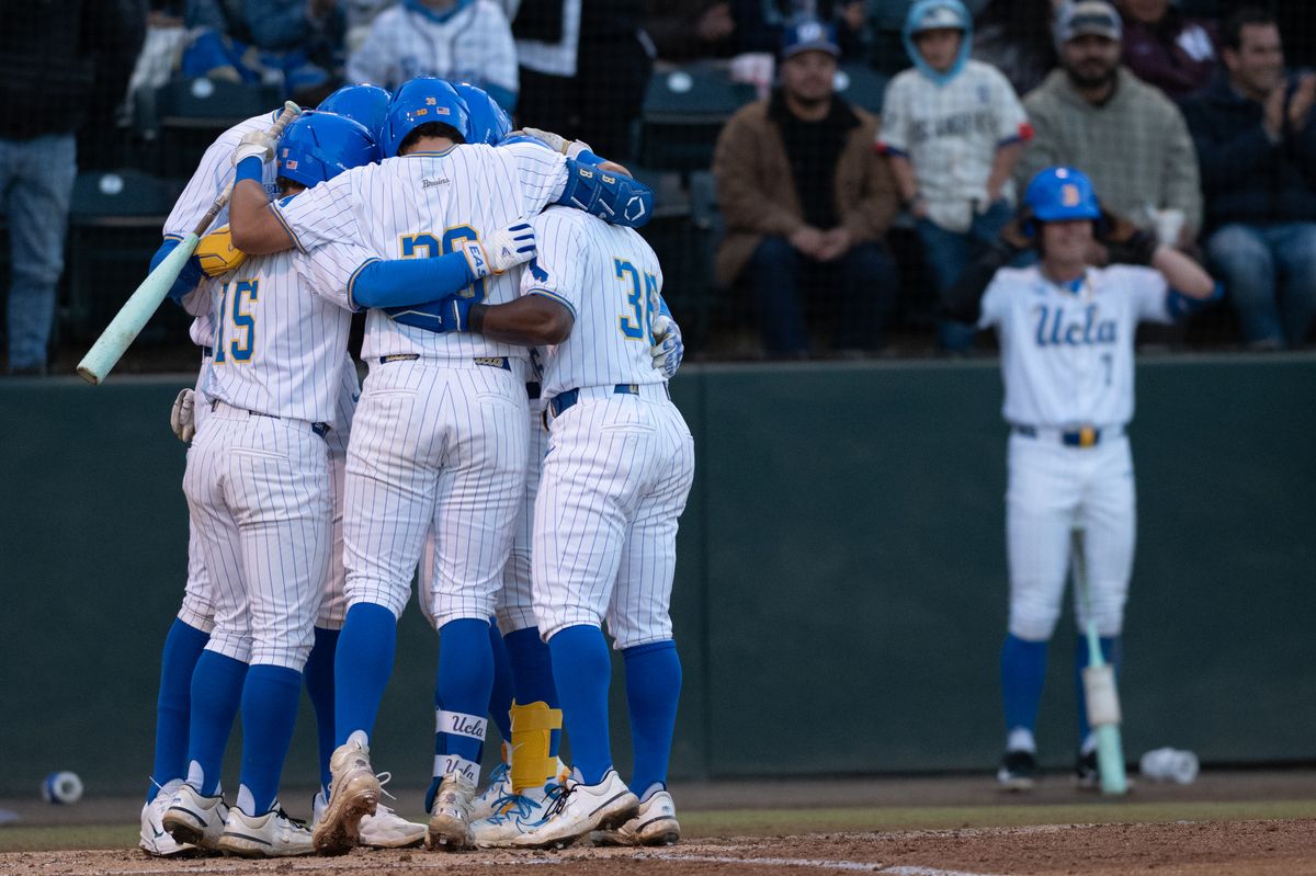 UCLA players huddle up and celebrate after hitting a homerun during a game between TCU and UCLA on Friday, February 20,2026 at Jackie Robinson Stadium in Los Angeles Calif UCLA players huddle up and celebrate after hitting a homerun during a game between TCU and UCLA on Friday, February 20,2026 at Jackie Robinson Stadium in Los Angeles Calif