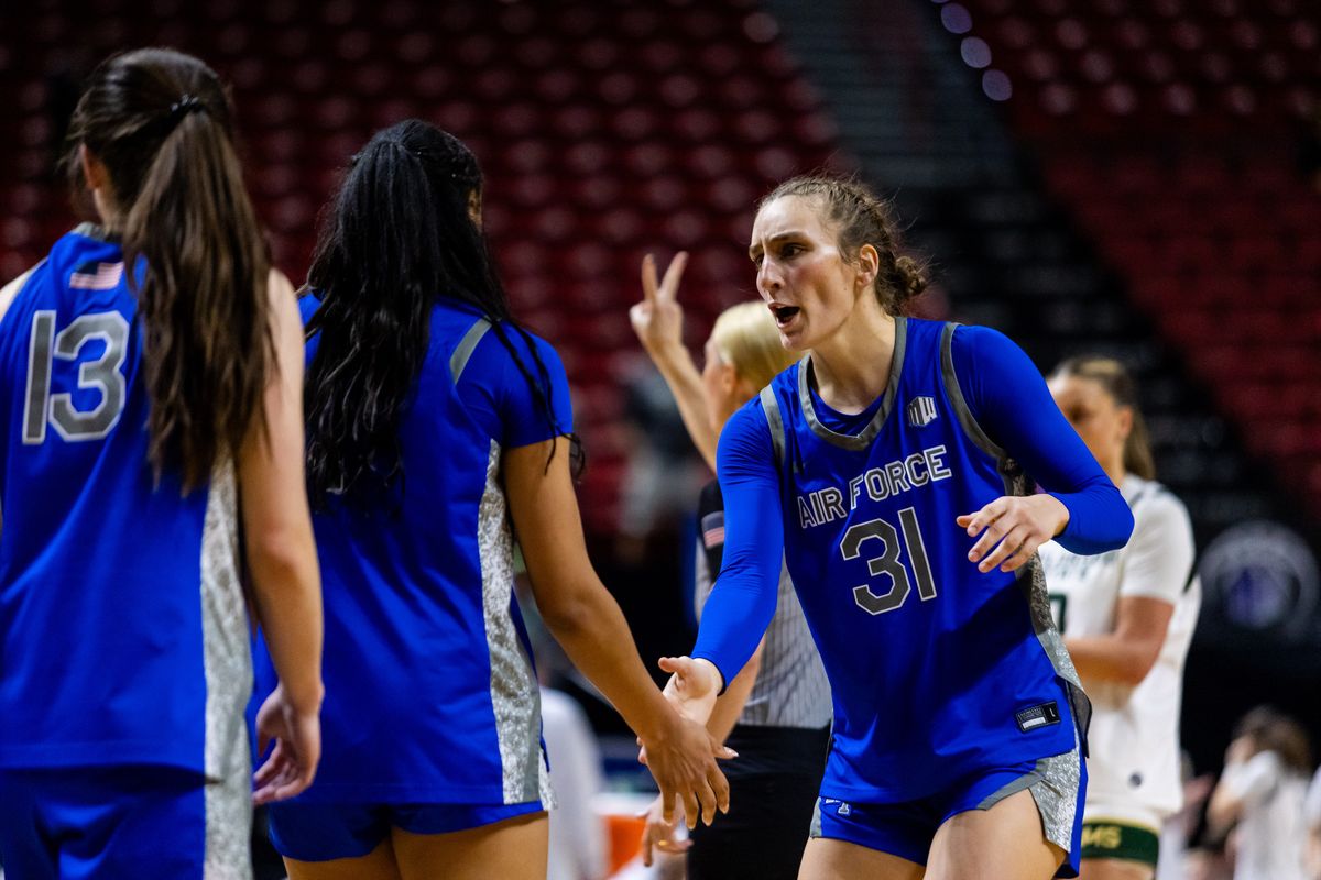 Air Force forward Emily Adams (31) high-fives teammates during a Mountain West Tournament championship game between Air Force and the Colorado State Rams, Tuesday March 10, 2026 in Las Vegas, Nev. Air Force forward Emily Adams (31) high-fives teammates during a Mountain West Tournament championship game between Air Force and the Colorado State Rams, Tuesday March 10, 2026 in Las Vegas, Nev.