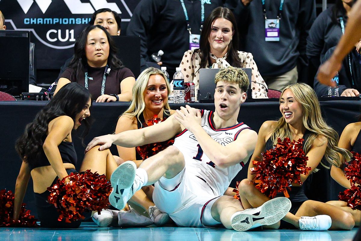 Gonzaga Bulldogs G Mario Saint-Supéry (17) falls into the Oregon State Beavers cheerleaders after making a basket during the 2026 WCC Tournament Semi-Finals against the Oregon State Beavers on Monday March 9, 2026, in Las Vegas, Nevada. Gonzaga Bulldogs G Mario Saint-Supéry (17) falls into the Oregon State Beavers cheerleaders after making a basket during the 2026 WCC Tournament Semi-Finals against the Oregon State Beavers on Monday March 9, 2026, in Las Vegas, Nevada.