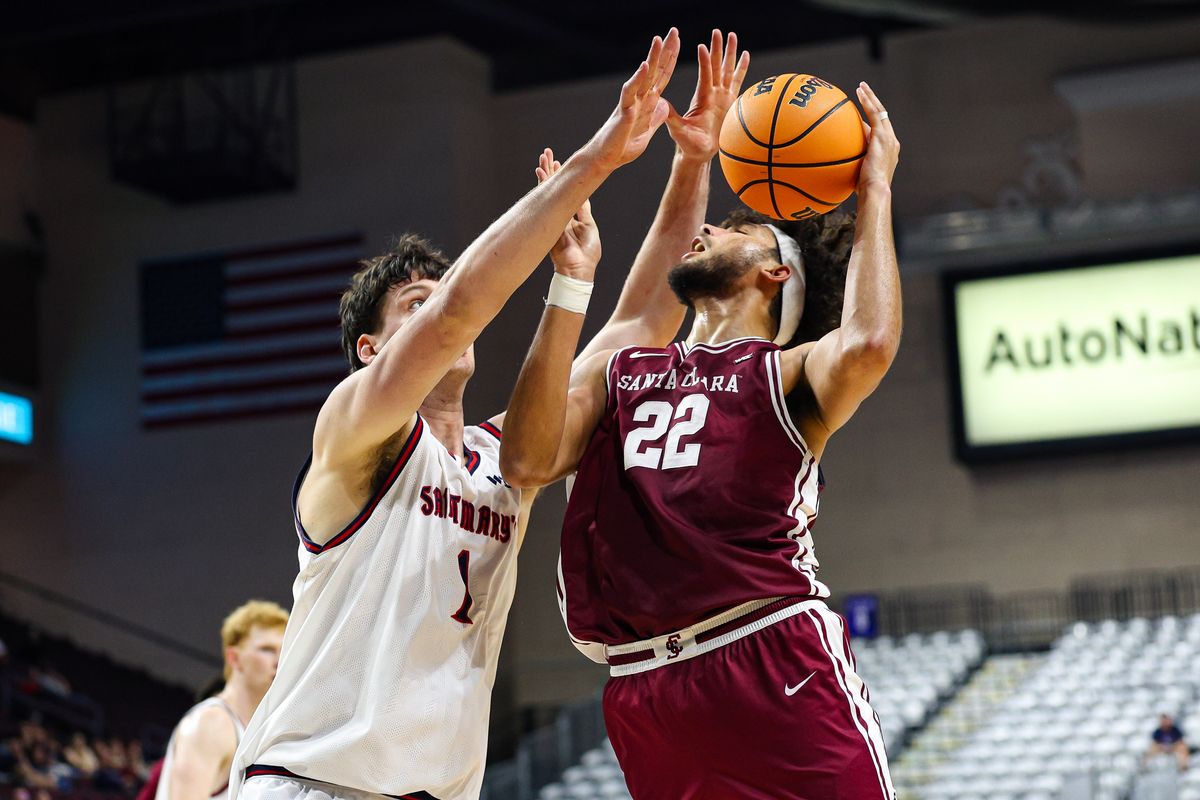 Santa Clara Broncos F Allen Graves (22) shoots a basket while being fouled by Saint Mary's Gaels C Harry Wessels (1) at the 2026 WCC Tournament Semi-Finals on Monday March 9, 2026, in Las Vegas, Nevada. Santa Clara Broncos F Allen Graves (22) shoots a basket while being fouled by Saint Mary's Gaels C Harry Wessels (1) at the 2026 WCC Tournament Semi-Finals on Monday March 9, 2026, in Las Vegas, Nevada.