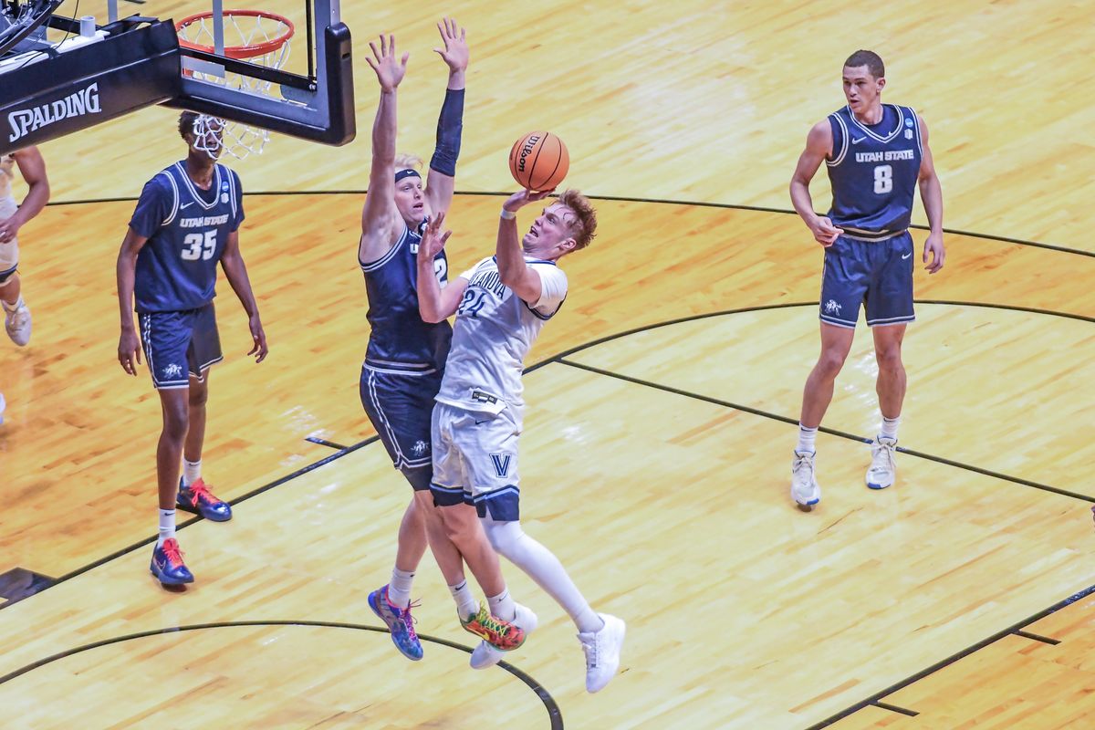 Villanova forward Duke Brennan (24) drives to the basket for a shot during an NCCA March Madness game against Utah State Friday March 20, 2026 in San Diego , California. Villanova forward Duke Brennan (24) drives to the basket for a shot during an NCCA March Madness game against Utah State Friday March 20, 2026 in San Diego , California.