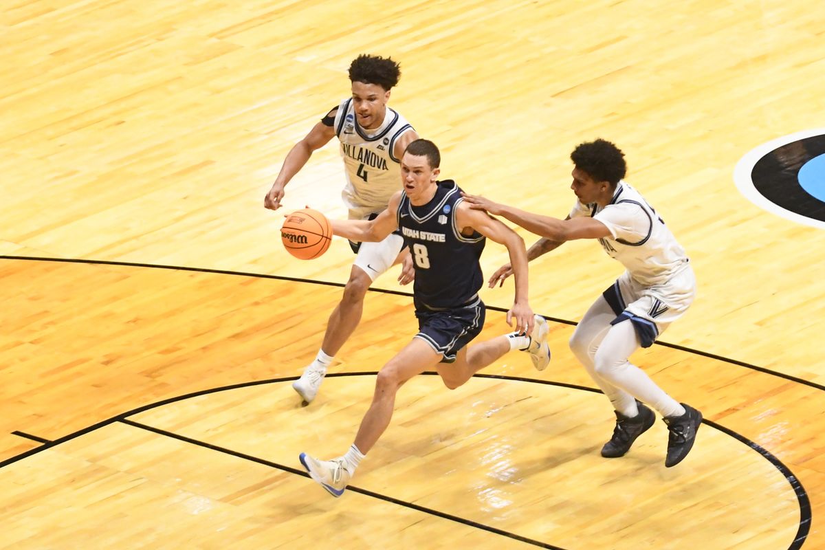 Utah State guard Drake Allen (8) drives to the basket during an NCCA March Madness game against Villanova Friday March 20, 2026 in San Diego , California. Utah State guard Drake Allen (8) drives to the basket during an NCCA March Madness game against Villanova Friday March 20, 2026 in San Diego , California.