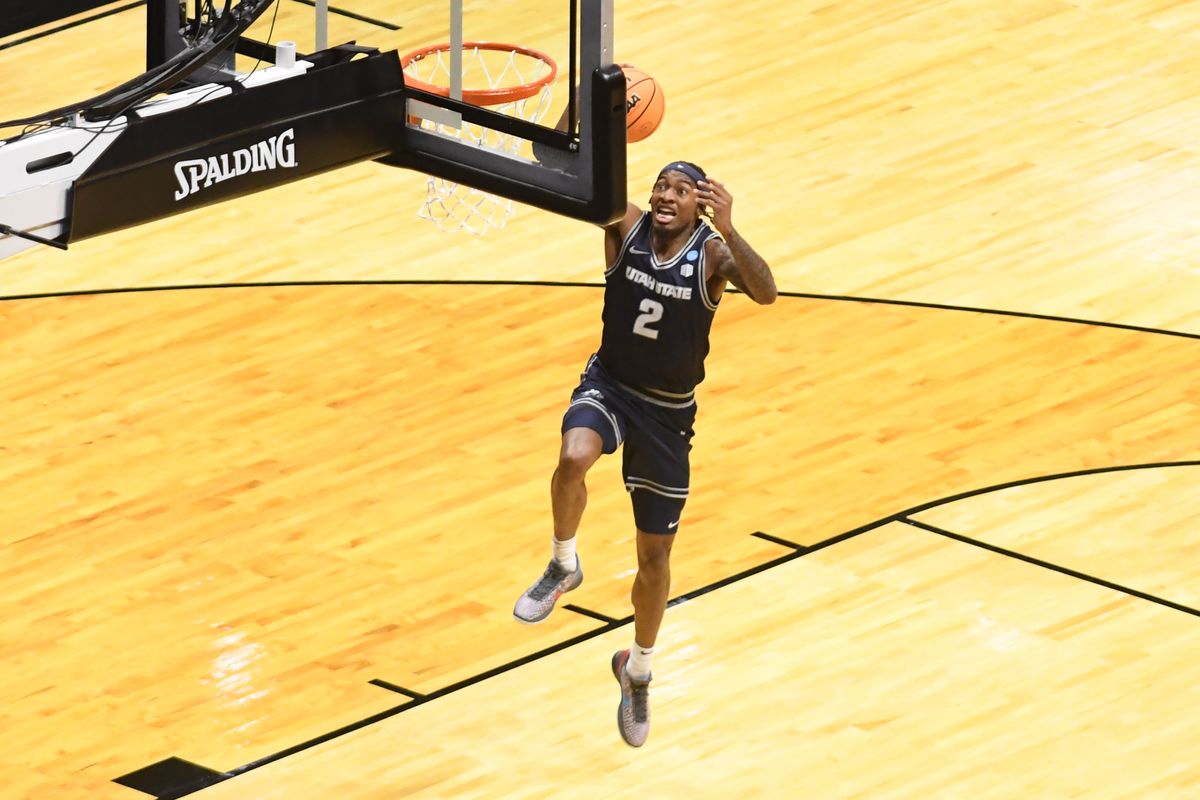 Utah State guard MJ Collins (2) shoots a shot during an NCCA March Madness game against Villanova Friday March 20, 2026 in San Diego , California. Utah State guard MJ Collins (2) shoots a shot during an NCCA March Madness game against Villanova Friday March 20, 2026 in San Diego , California.
