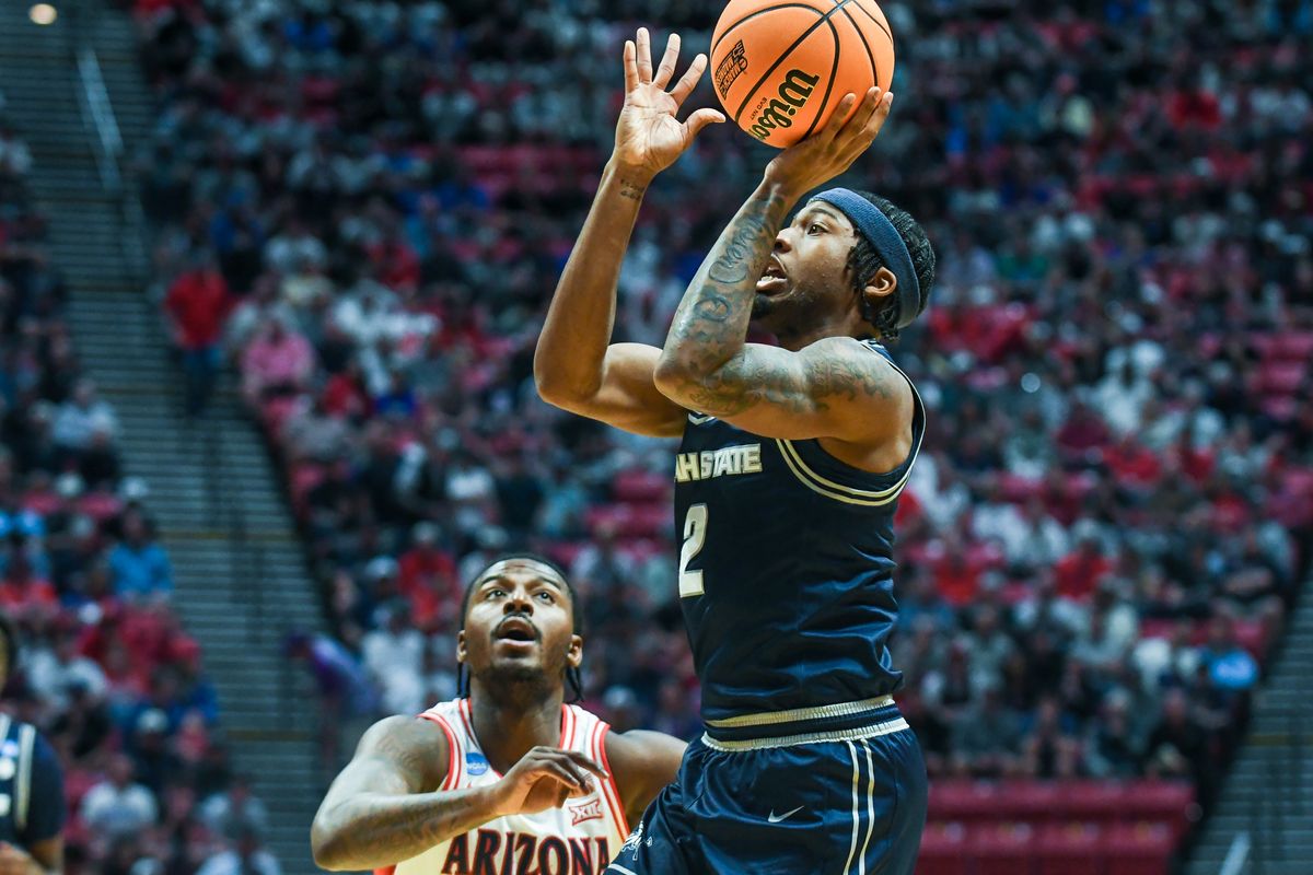 Utah State guard MJ Collins Jr. (2) shoots the ball during an NCAA East Region second round game against Arizona Sunday March 22, 2026 in San Diego, California. Utah State guard MJ Collins Jr. (2) shoots the ball during an NCAA East Region second round game against Arizona Sunday March 22, 2026 in San Diego, California.