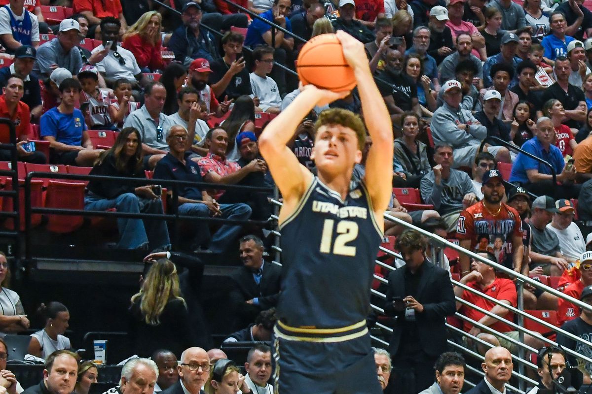 Utah State guard Mason Falslev (12) shoots the ball during an NCAA East Region second round game against Arizona Sunday March 22, 2026 in San Diego, California. Utah State guard Mason Falslev (12) shoots the ball during an NCAA East Region second round game against Arizona Sunday March 22, 2026 in San Diego, California.