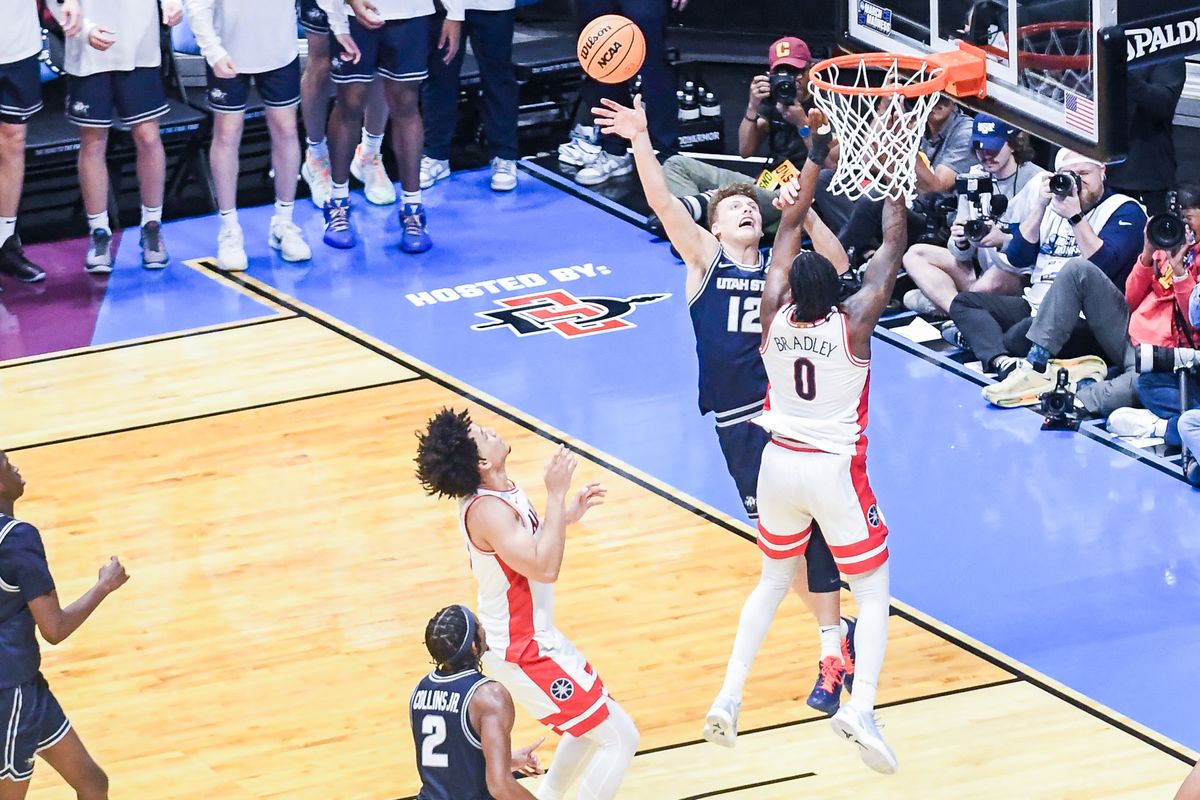 Utah State guard Mason Falslev (12) shoots the ball during an NCAA East Region second round game against Arizona Sunday March 22, 2026 in San Diego, California. Utah State guard Mason Falslev (12) shoots the ball during an NCAA East Region second round game against Arizona Sunday March 22, 2026 in San Diego, California.