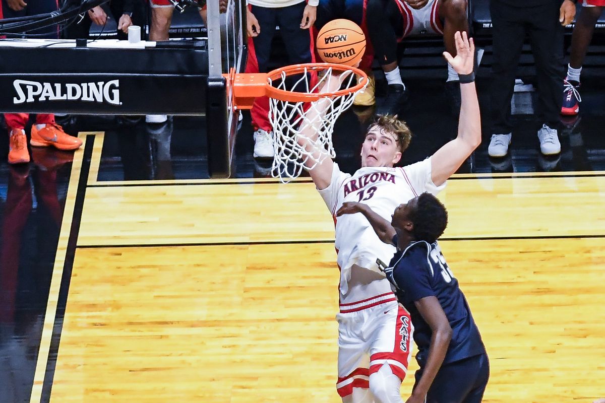 Arizona center Motiejus Krivas (13) shoots the ball during an NCAA East Region second round game against Utah State Sunday March 22, 2026 in San Diego, California. Arizona center Motiejus Krivas (13) shoots the ball during an NCAA East Region second round game against Utah State Sunday March 22, 2026 in San Diego, California.