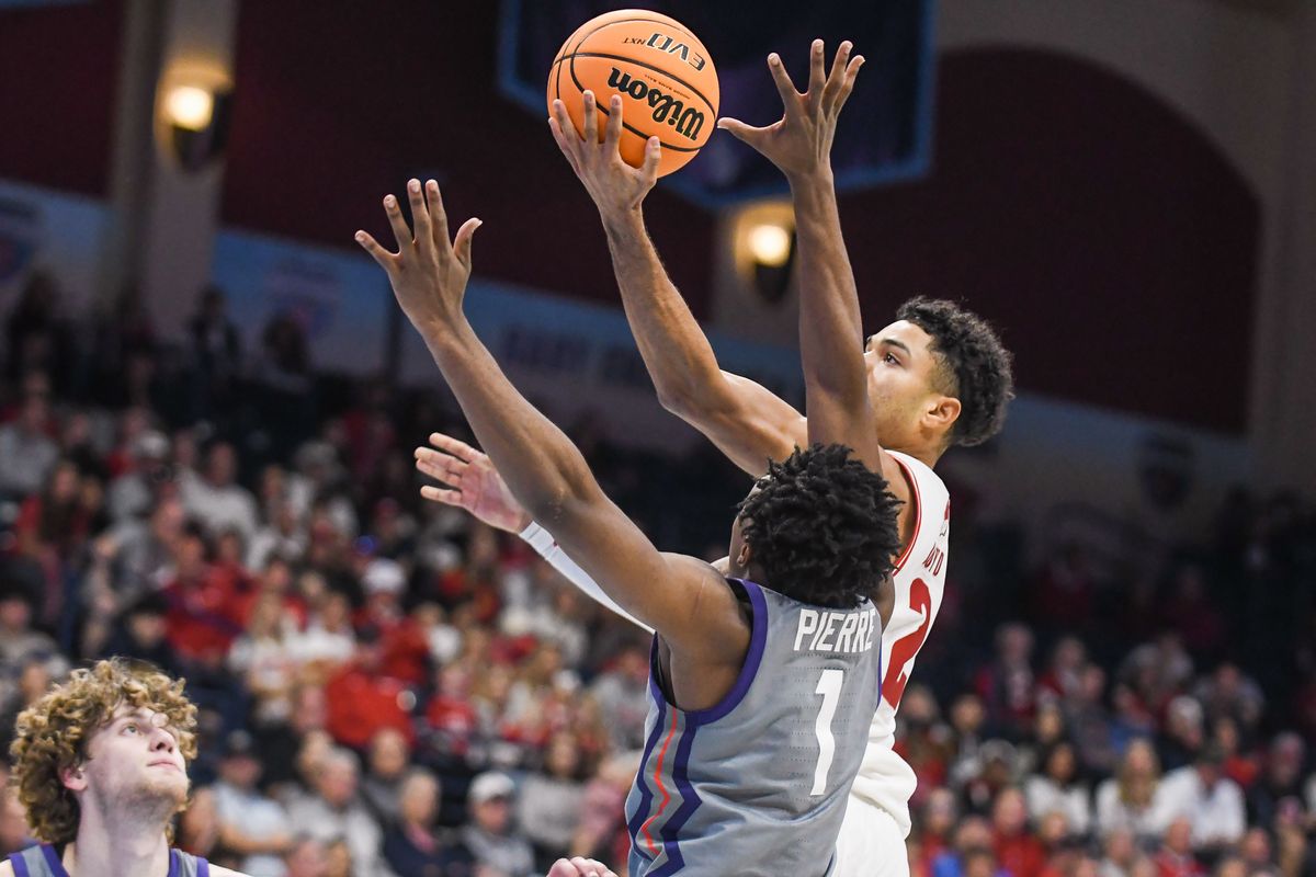 Wisconsin guard Nick Boyd (2) shoots of the defense of TCU guard Jayden Pierre (1) during an NCAA basketball game against TCU, Friday November 28, 2025 in San Diego, California. Wisconsin guard Nick Boyd (2) shoots of the defense of TCU guard Jayden Pierre (1) during an NCAA basketball game against TCU, Friday November 28, 2025 in San Diego, California.