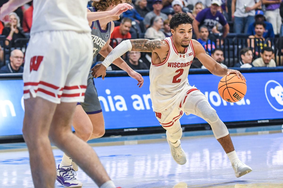 Wisconsin guard Nick Boyd (2) drives to the basket during an NCAA basketball game against Wisconsin, Friday November 28, 2025 in San Diego, California. Wisconsin guard Nick Boyd (2) drives to the basket during an NCAA basketball game against Wisconsin, Friday November 28, 2025 in San Diego, California.