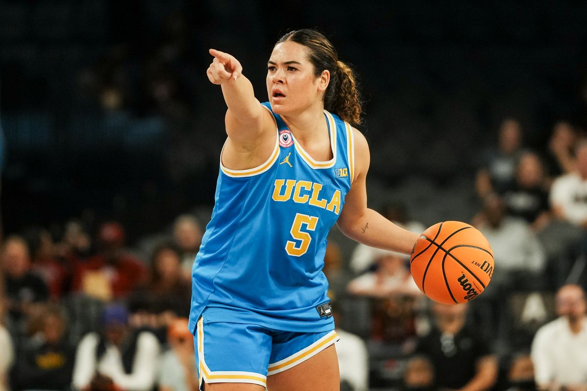 UCLA guard Charisse Leger-Walker (5) motions to her teammates during second half of college basketball game against Texas on Wednesday, Nov. 26, 2025 during the Players Era tournament at Michelob Ultra Arena in Las Vegas. UCLA guard Charisse Leger-Walker (5) motions to her teammates during second half of college basketball game against Texas on Wednesday, Nov. 26, 2025 during the Players Era tournament at Michelob Ultra Arena in Las Vegas.