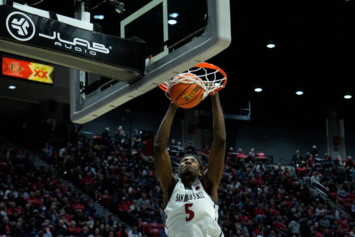 San Diego State forward Pharoah Compton (5) dunks during an NCAA Basketball game against Long Beach State, Tuesday November 4, 2025 in San Diego, Calif. San Diego State forward Pharoah Compton (5) dunks during an NCAA Basketball game against Long Beach State, Tuesday November 4, 2025 in San Diego, Calif.