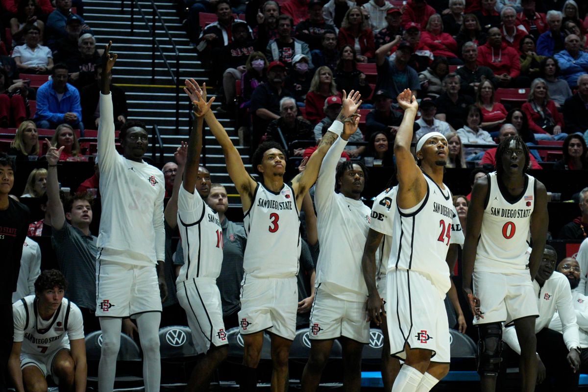 San Diego State guard Taj DeGourville (24) makes a three-pointer during an NCAA Basketball game against Long Beach State, Tuesday November 4, 2025 in San Diego, Calif. San Diego State guard Taj DeGourville (24) makes a three-pointer during an NCAA Basketball game against Long Beach State, Tuesday November 4, 2025 in San Diego, Calif.