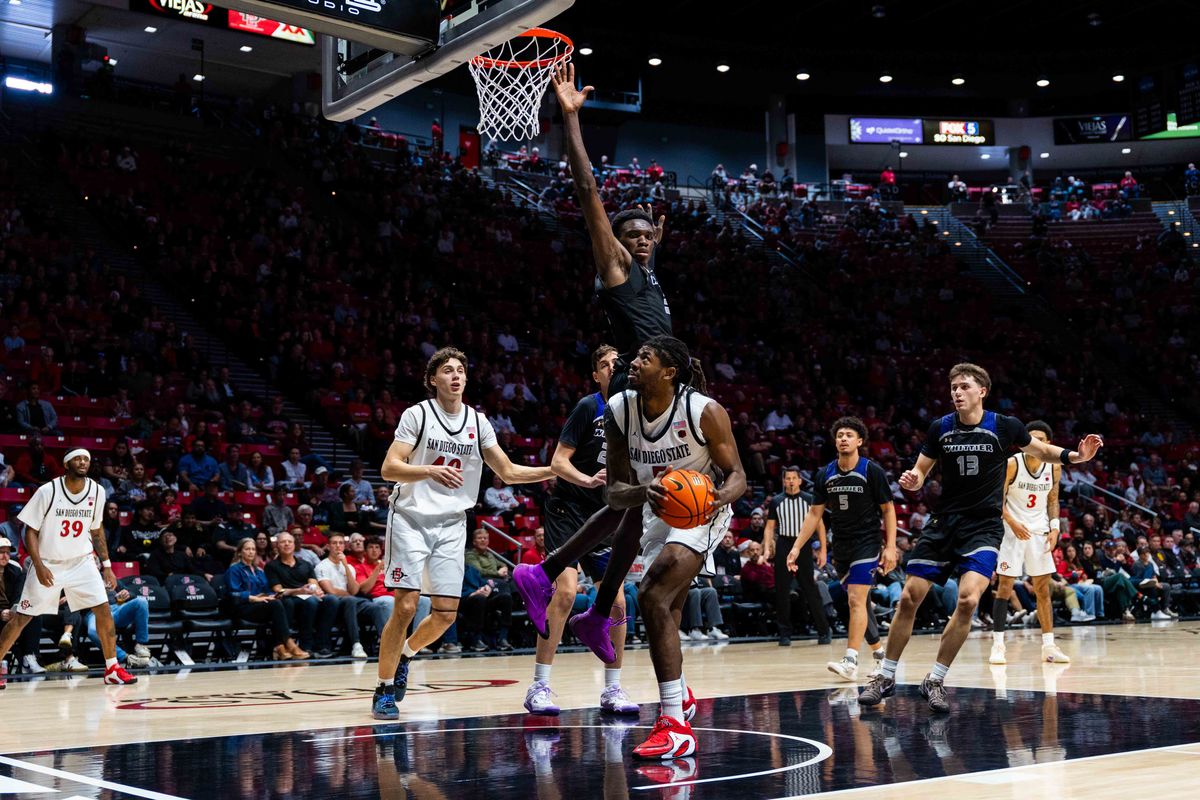 San Diego State forward Pharoah Compton (5) looks to shoot during an NCAA Basketball game between Whittier and San Diego State, Monday December 22, 2025 at Viejas Arena in San Diego, Calif. San Diego State forward Pharoah Compton (5) looks to shoot during an NCAA Basketball game between Whittier and San Diego State, Monday December 22, 2025 at Viejas Arena in San Diego, Calif.