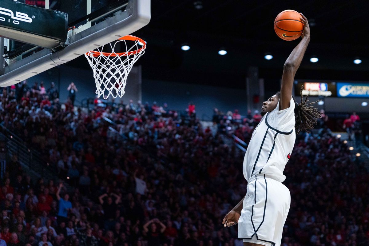 San Diego State forward Pharoah Compton (5) dunks during an NCAA Basketball game between New Mexico and San Diego State, Saturday January 17, 2026 at Viejas Arena in San Diego, Calif. San Diego State forward Pharoah Compton (5) dunks during an NCAA Basketball game between New Mexico and San Diego State, Saturday January 17, 2026 at Viejas Arena in San Diego, Calif.
