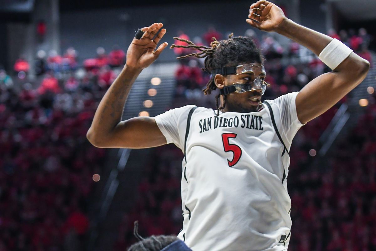 SDSU forward Pharaoh Compton (5) leaps for the rebound during an NCAA Basketball game against Nevada Saturday February 14, 2026 in California.