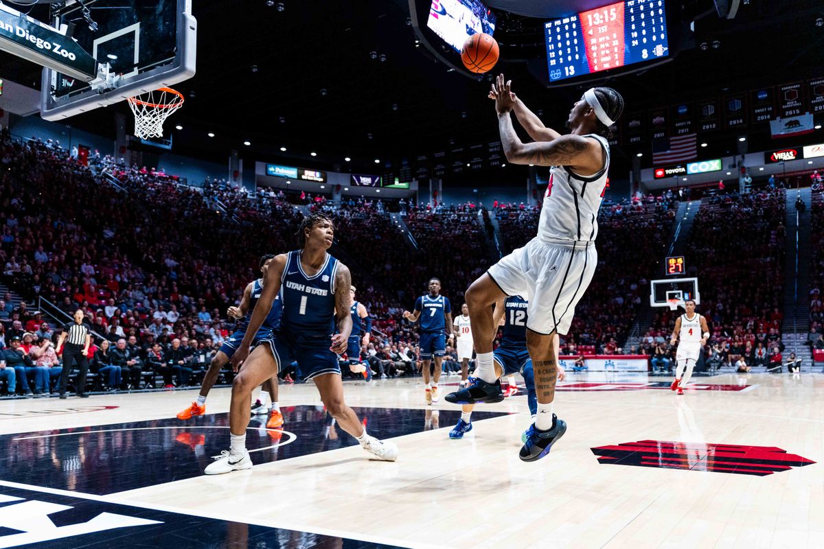 San Diego State guard Taj DeGourville (24) takes a shot during an NCAA Basketball game between Utah State and San Diego State, Wednesday February 25, 2026 at Viejas Arena in San Diego, Calif. San Diego State guard Taj DeGourville (24) takes a shot during an NCAA Basketball game between Utah State and San Diego State, Wednesday February 25, 2026 at Viejas Arena in San Diego, Calif.
