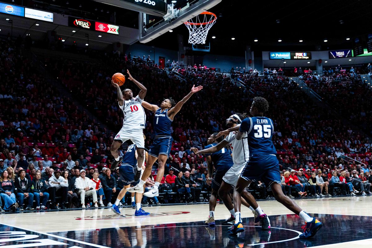 San Diego State guard BJ Davis (10) takes a shot during an NCAA Basketball game between Utah State and San Diego State, Wednesday February 25, 2026 at Viejas Arena in San Diego, Calif. San Diego State guard BJ Davis (10) takes a shot during an NCAA Basketball game between Utah State and San Diego State, Wednesday February 25, 2026 at Viejas Arena in San Diego, Calif.