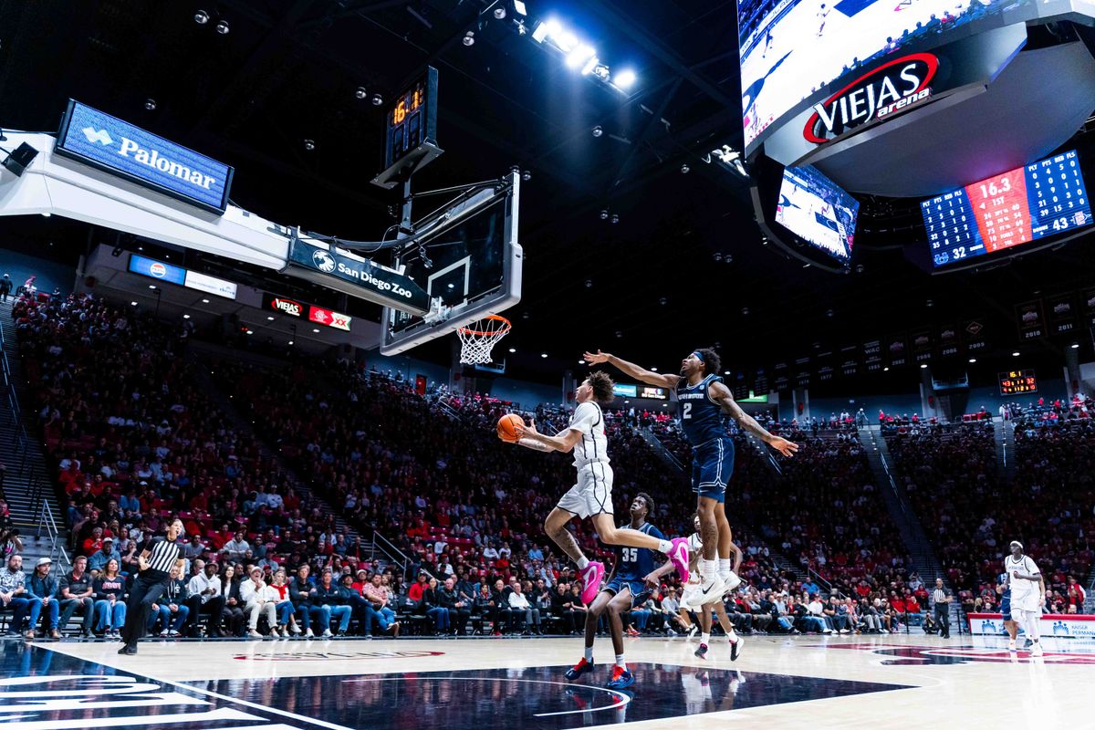San Diego State guard Miles Byrd (21) attempts a layup during an NCAA Basketball game between Utah State and San Diego State, Wednesday February 25, 2026 at Viejas Arena in San Diego, Calif. San Diego State guard Miles Byrd (21) attempts a layup during an NCAA Basketball game between Utah State and San Diego State, Wednesday February 25, 2026 at Viejas Arena in San Diego, Calif.