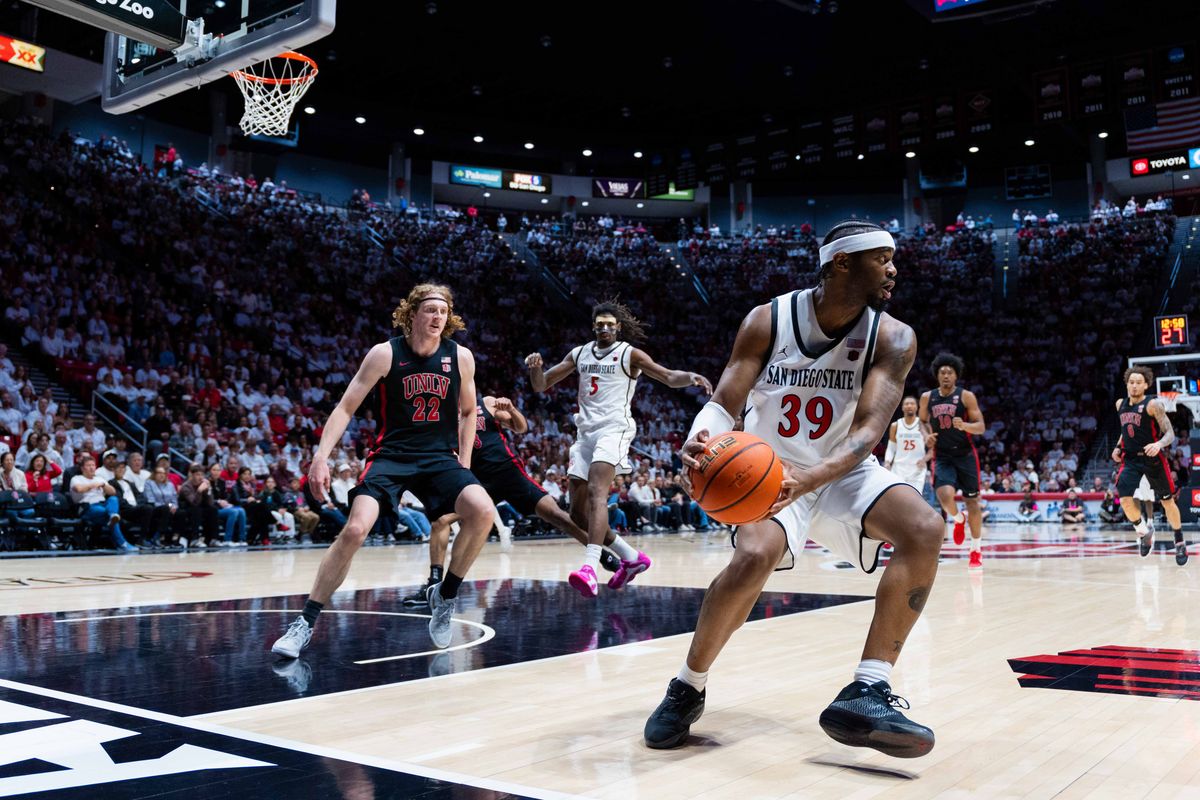 San Diego State guard Reese Dixon-Waters (39) saves the ball during an NCAA Basketball game between UNLV and San Diego State, Friday March 6, 2026 at Viejas Arena in San Diego, Calif. San Diego State guard Reese Dixon-Waters (39) saves the ball during an NCAA Basketball game between UNLV and San Diego State, Friday March 6, 2026 at Viejas Arena in San Diego, Calif.