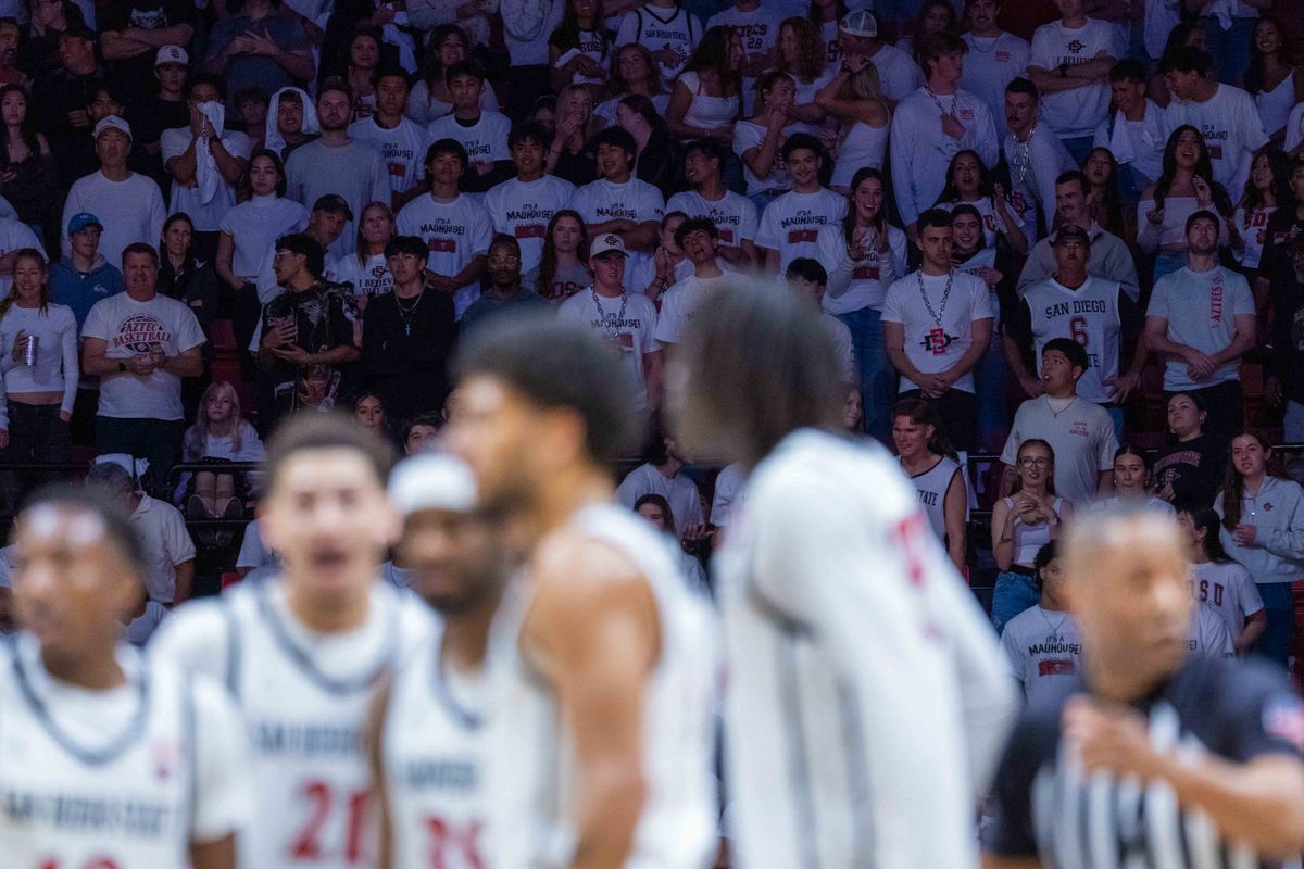 San Diego State fans wear white during an NCAA Basketball game between UNLV and San Diego State, Friday March 6, 2026 at Viejas Arena in San Diego, Calif. San Diego State fans wear white during an NCAA Basketball game between UNLV and San Diego State, Friday March 6, 2026 at Viejas Arena in San Diego, Calif.