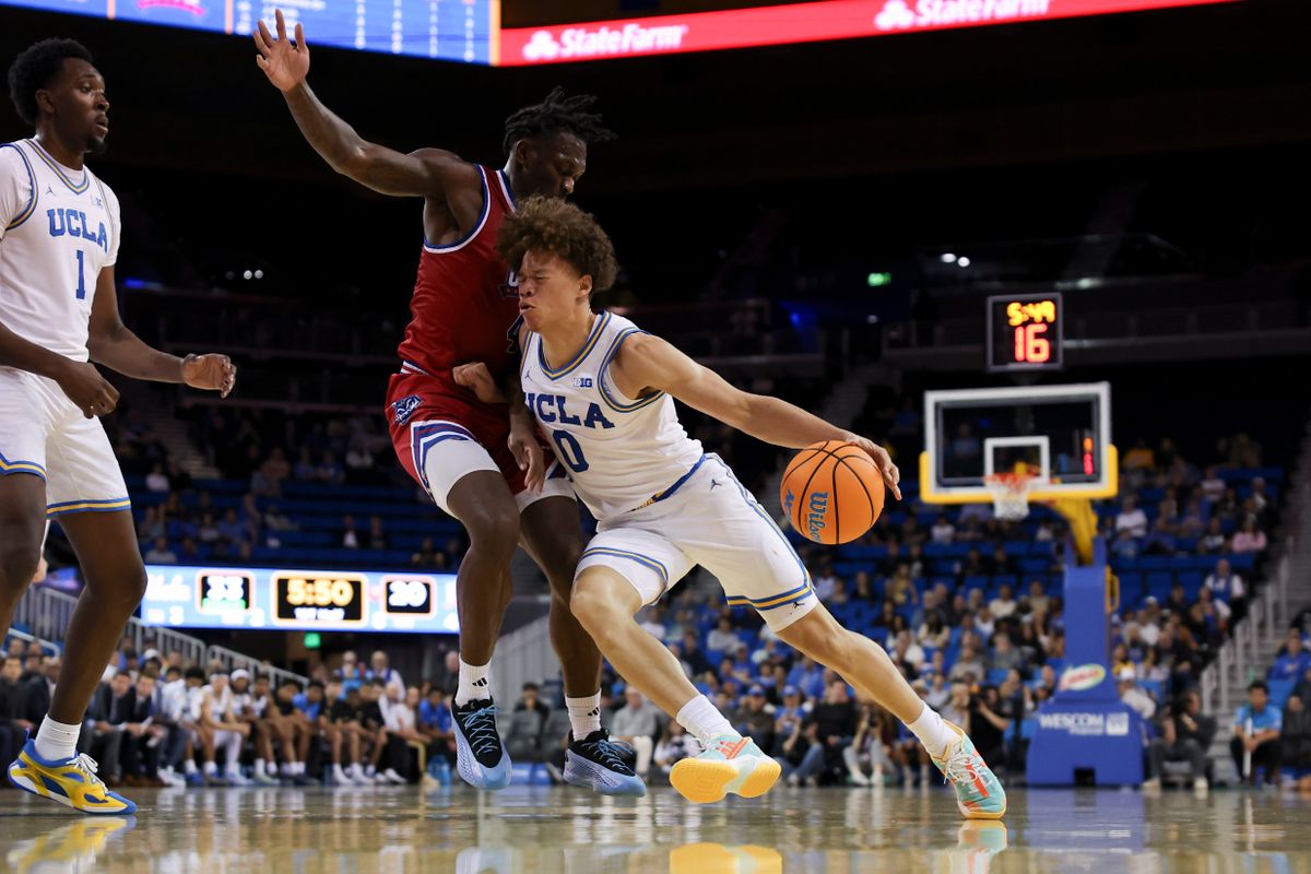 Guard Trent Perry #0 of the UCLA Bruins drives to towards the basket during an NCAA basketball game against the West Georgia Wolves, Monday November 10, 2025 in Los Angeles, Calif. Guard Trent Perry #0 of the UCLA Bruins drives to towards the basket during an NCAA basketball game against the West Georgia Wolves, Monday November 10, 2025 in Los Angeles, Calif.