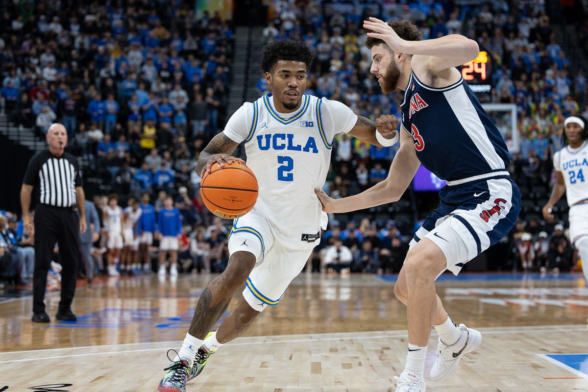 UCLA guard Donovan Dent (2) drives to the basket during a Big Ten Conference college basketball game against the Arizona Wildcats, Friday November 14, 2025 in Inglewood, Calif. UCLA guard Donovan Dent (2) drives to the basket during a Big Ten Conference college basketball game against the Arizona Wildcats, Friday November 14, 2025 in Inglewood, Calif.