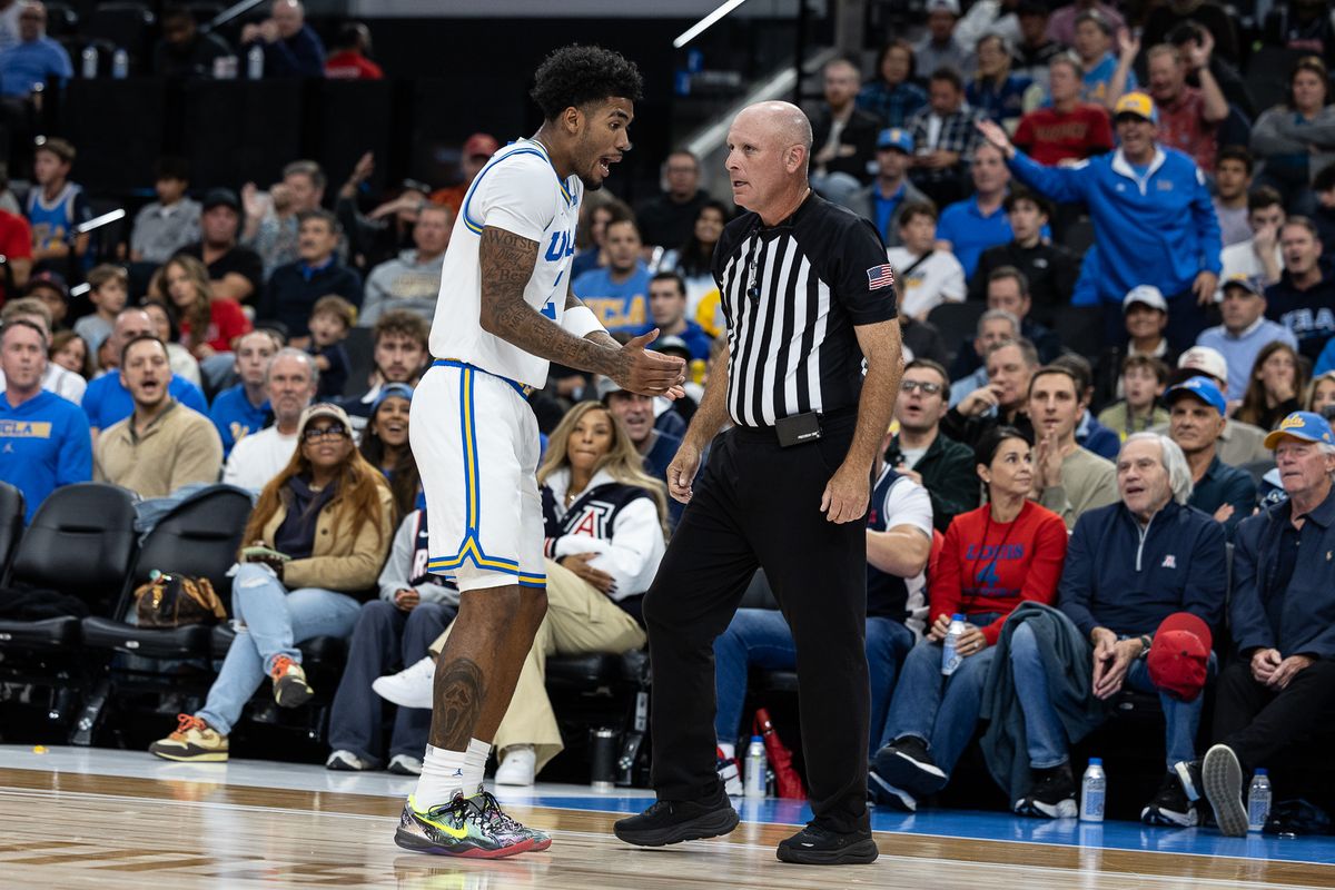 UCLA guard Donovan Dent (2) talks to the ref during a Big Ten Conference college basketball game against the Arizona Wildcats, Friday November 14, 2025 in Inglewood, Calif. UCLA guard Donovan Dent (2) talks to the ref during a Big Ten Conference college basketball game against the Arizona Wildcats, Friday November 14, 2025 in Inglewood, Calif.