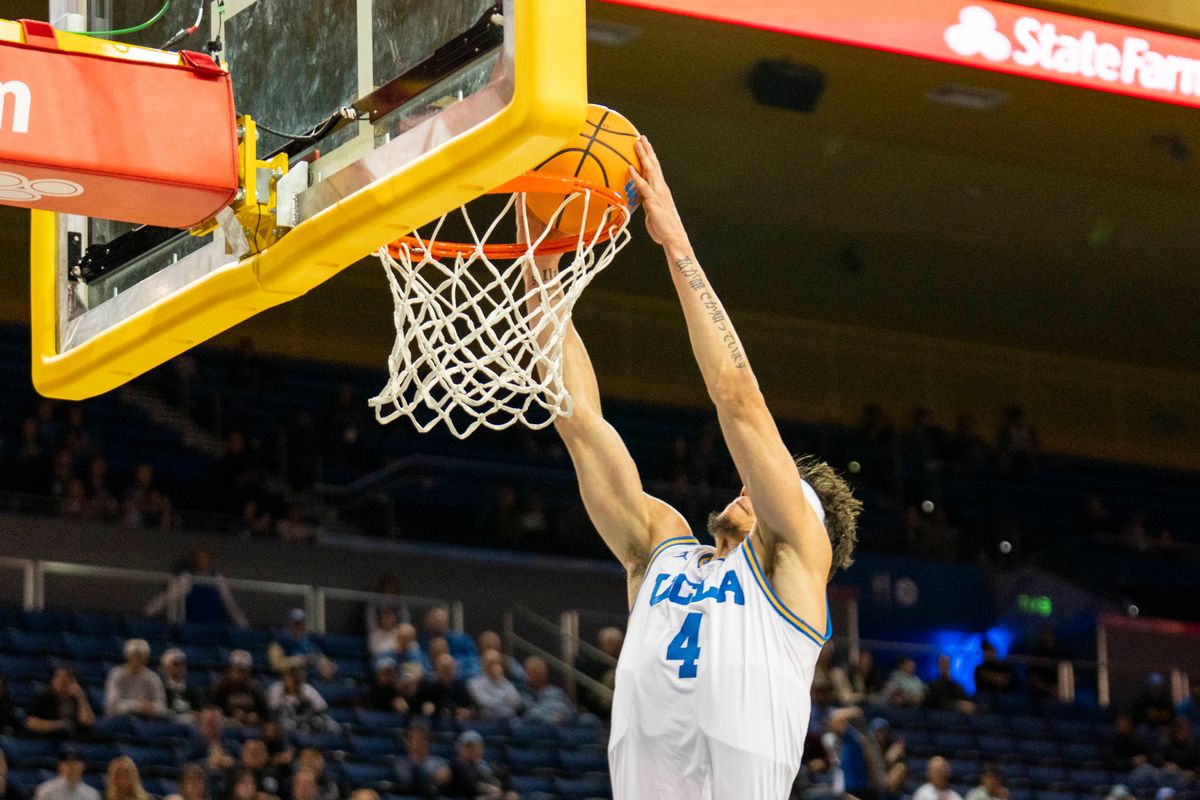 UCLA guard Jamar Brown (4) gets a fast break dunk during an NCAA basketball game against Presbyterian, Friday November 21st, 2025 in Los Angeles, California. UCLA guard Jamar Brown (4) gets a fast break dunk during an NCAA basketball game against Presbyterian, Friday November 21st, 2025 in Los Angeles, California.