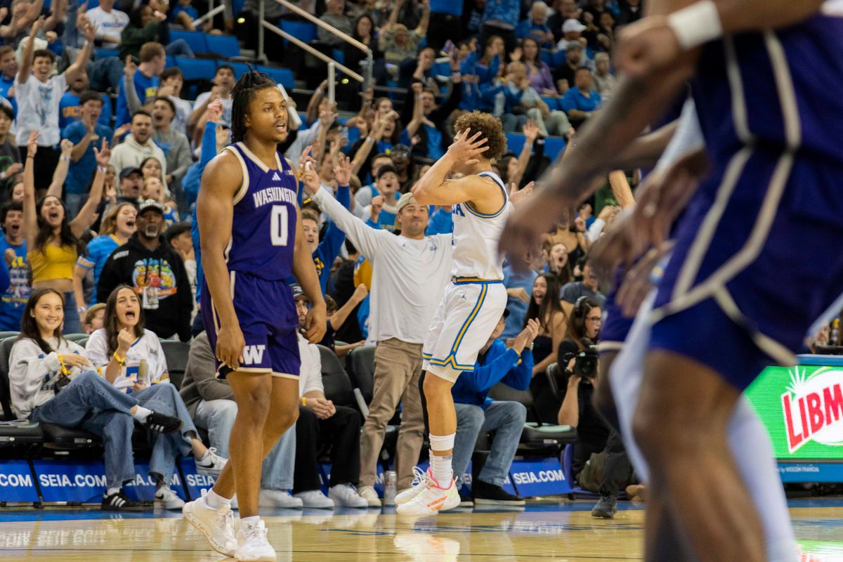 UCLA guard Trent Perry (0) celebrates with the crowd after hitting a three during an NCAA basketball game against Washington, Saturday February 7th, 2026 in Los Angeles, California. UCLA guard Trent Perry (0) celebrates with the crowd after hitting a three during an NCAA basketball game against Washington, Saturday February 7th, 2026 in Los Angeles, California.
