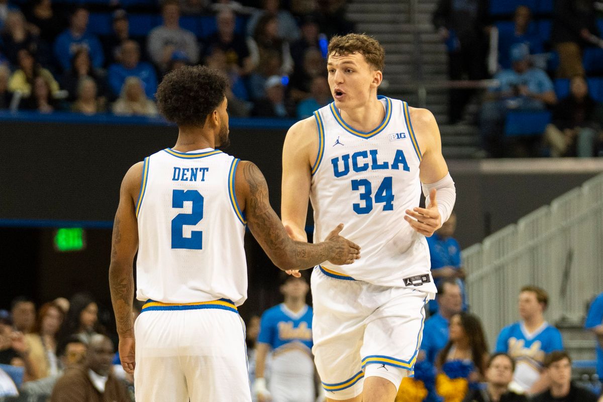 UCLA forward Tyler Bilodeau (34) talks it out with guard Donovan Dent (2) after a turnover during an NCAA basketball game against Washington, Saturday February 7th, 2026 in Los Angeles, California. UCLA forward Tyler Bilodeau (34) talks it out with guard Donovan Dent (2) after a turnover during an NCAA basketball game against Washington, Saturday February 7th, 2026 in Los Angeles, California.