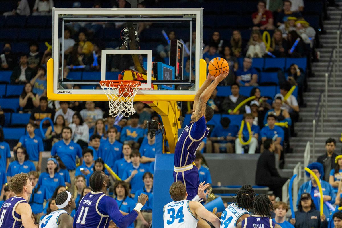 Washington forward Bryson Tucker (8) finishes the lob during an NCAA basketball game against UCLA, Saturday February 7th, 2026 in Los Angeles, California. Washington forward Bryson Tucker (8) finishes the lob during an NCAA basketball game against UCLA, Saturday February 7th, 2026 in Los Angeles, California.