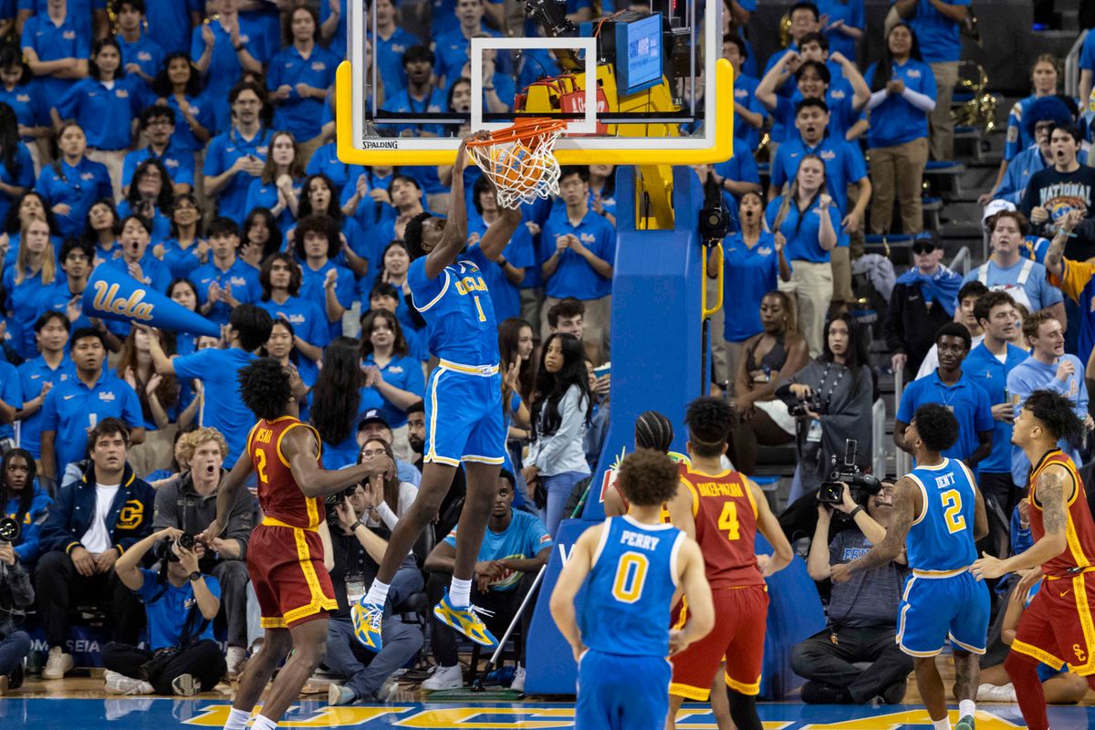 Xavier Booker #1 of the UCLA Bruins dunks the ball during an NCAA basketball game against the USC Trojans, Tuesday February 24, 2026 in Los Angeles, Calif.