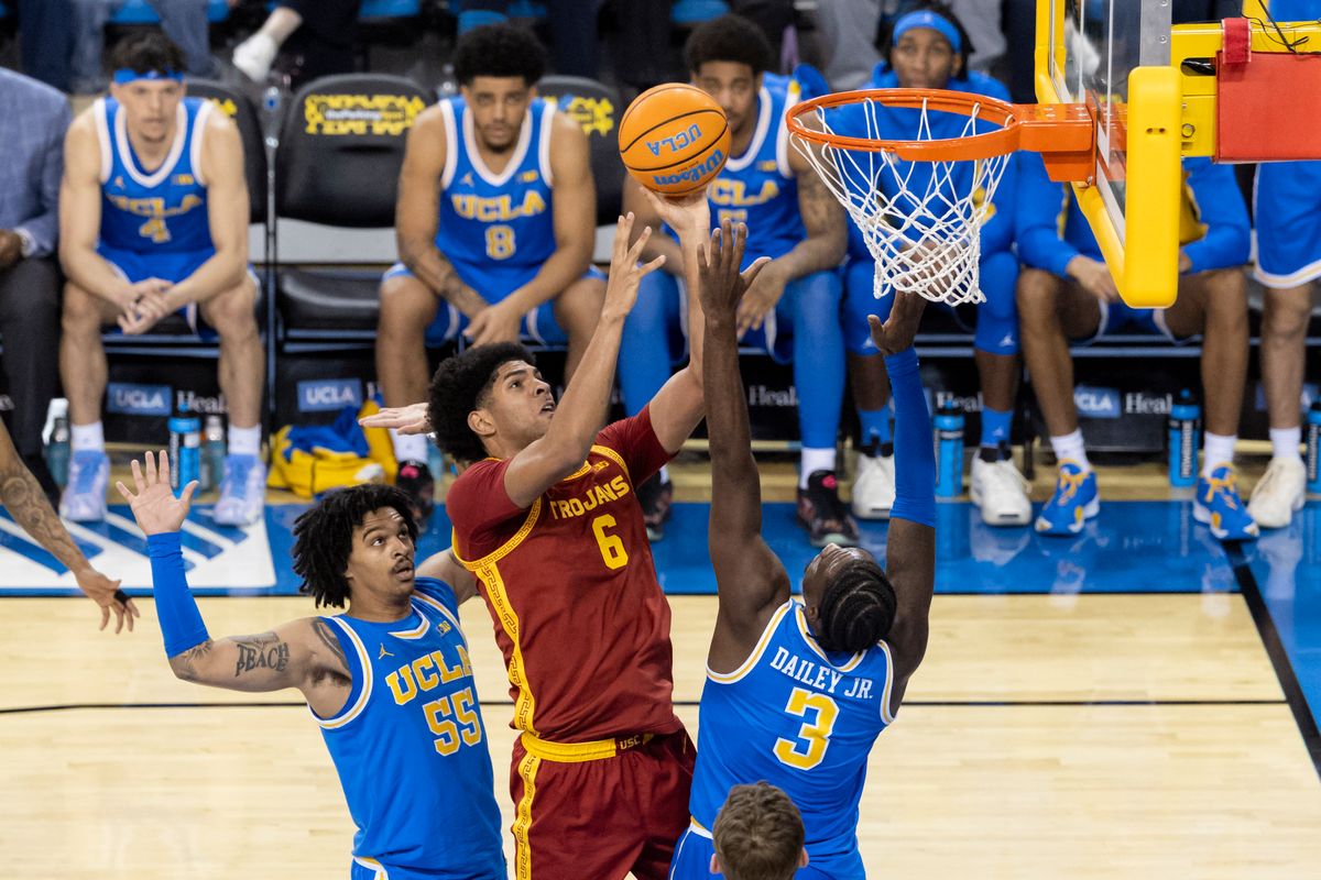 Jacob Cofie #6 of the USC Trojans lays the ball up during an NCAA basketball game against the UCLA Bruins, Tuesday February 24, 2026 in Los Angeles, Calif.