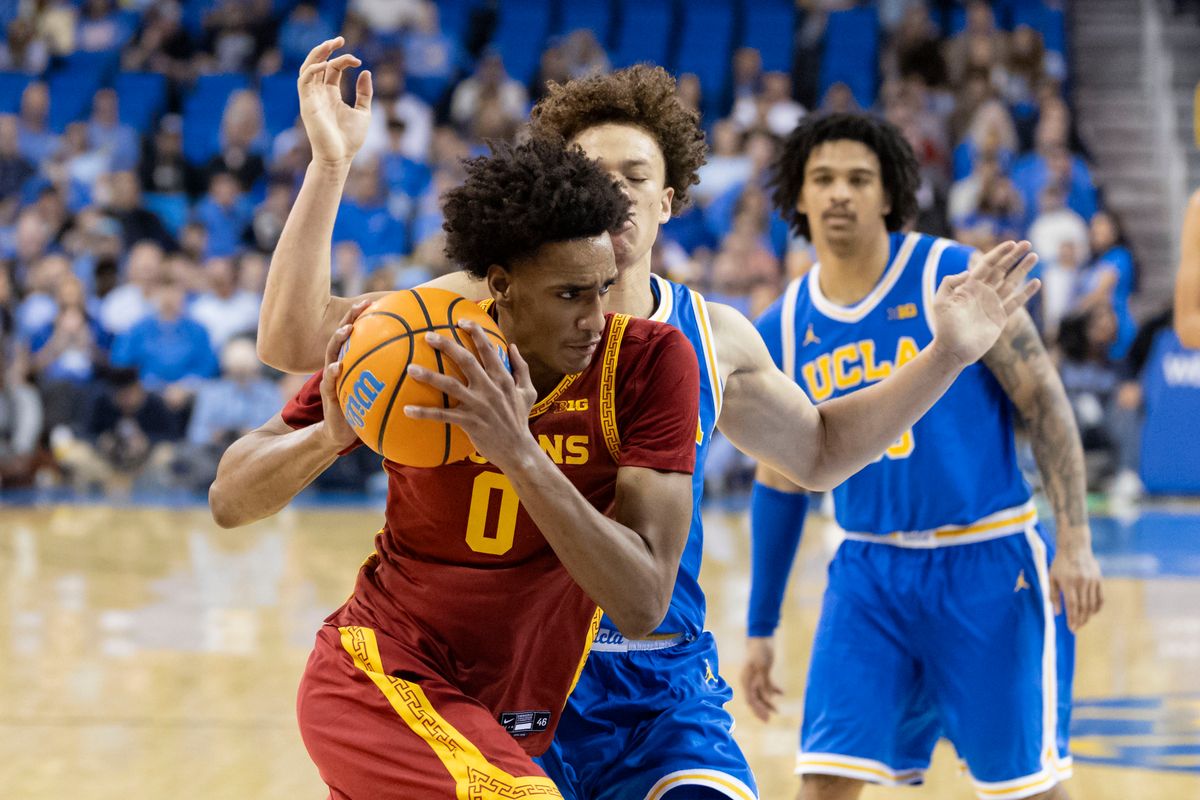 Alijah Arenas #0 of the USC Trojans drives towards the basket during an NCAA basketball game against the UCLA Bruins, Tuesday February 24, 2026 in Los Angeles, Calif.