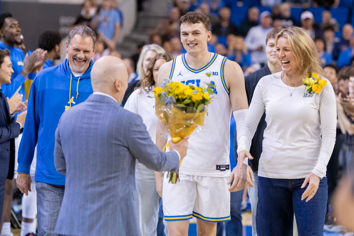 Tyler Bilodeau #34 of the UCLA Bruins and his parents are greeted by head coach Mick Cronin of the UCLA Bruins during the senior night ceremony before an NCAA basketball game against the Nebraska Cornhuskers, Tuesday March 3, 2026 in Los Angeles, Calif. Tyler Bilodeau #34 of the UCLA Bruins and his parents are greeted by head coach Mick Cronin of the UCLA Bruins during the senior night ceremony before an NCAA basketball game against the Nebraska Cornhuskers, Tuesday March 3, 2026 in Los Angeles, Calif.